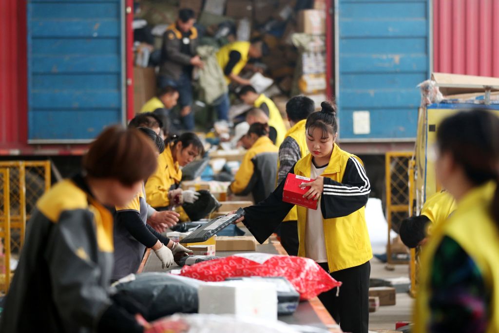 Employees sorting packages ahead of Singles Day in Huaibei in China's eastern Anhui province on Nov. 9, 2017. (STR—AFP/Getty Images)
