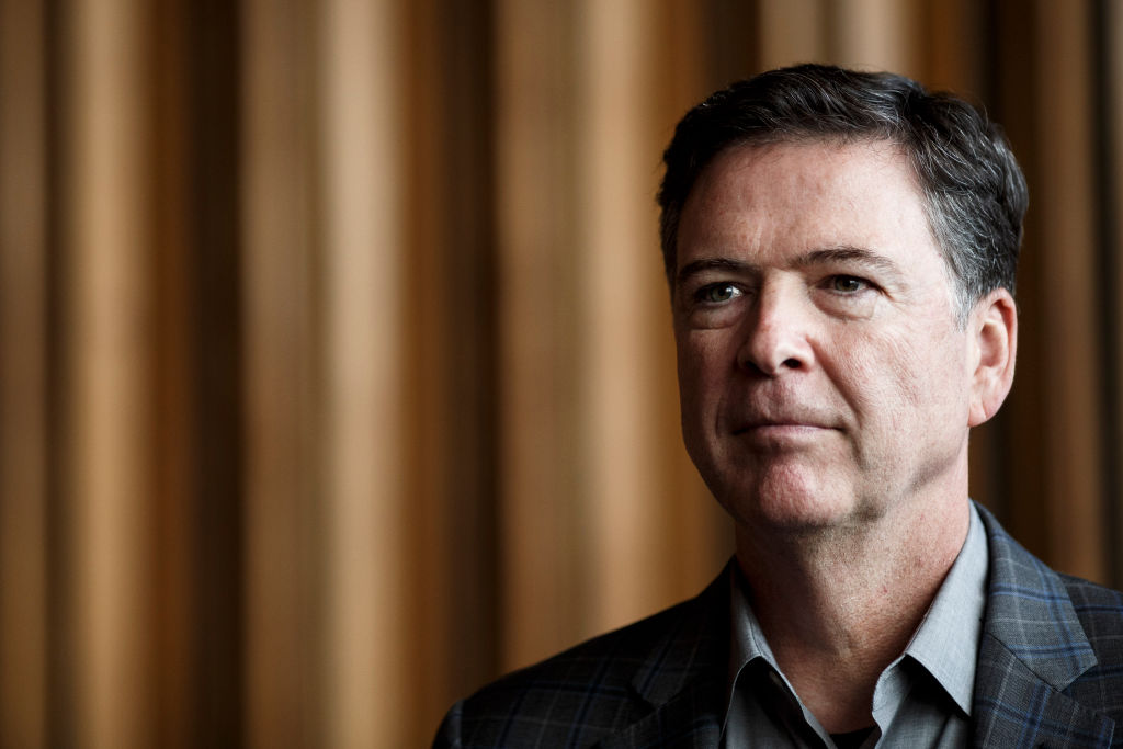 Former FBI Director James Comey talks backstage before a panel discussion about his book "A Higher Loyalty" on June 19, 2018 in Berlin, Germany. (Carsten Koall&mdash;Getty Images)