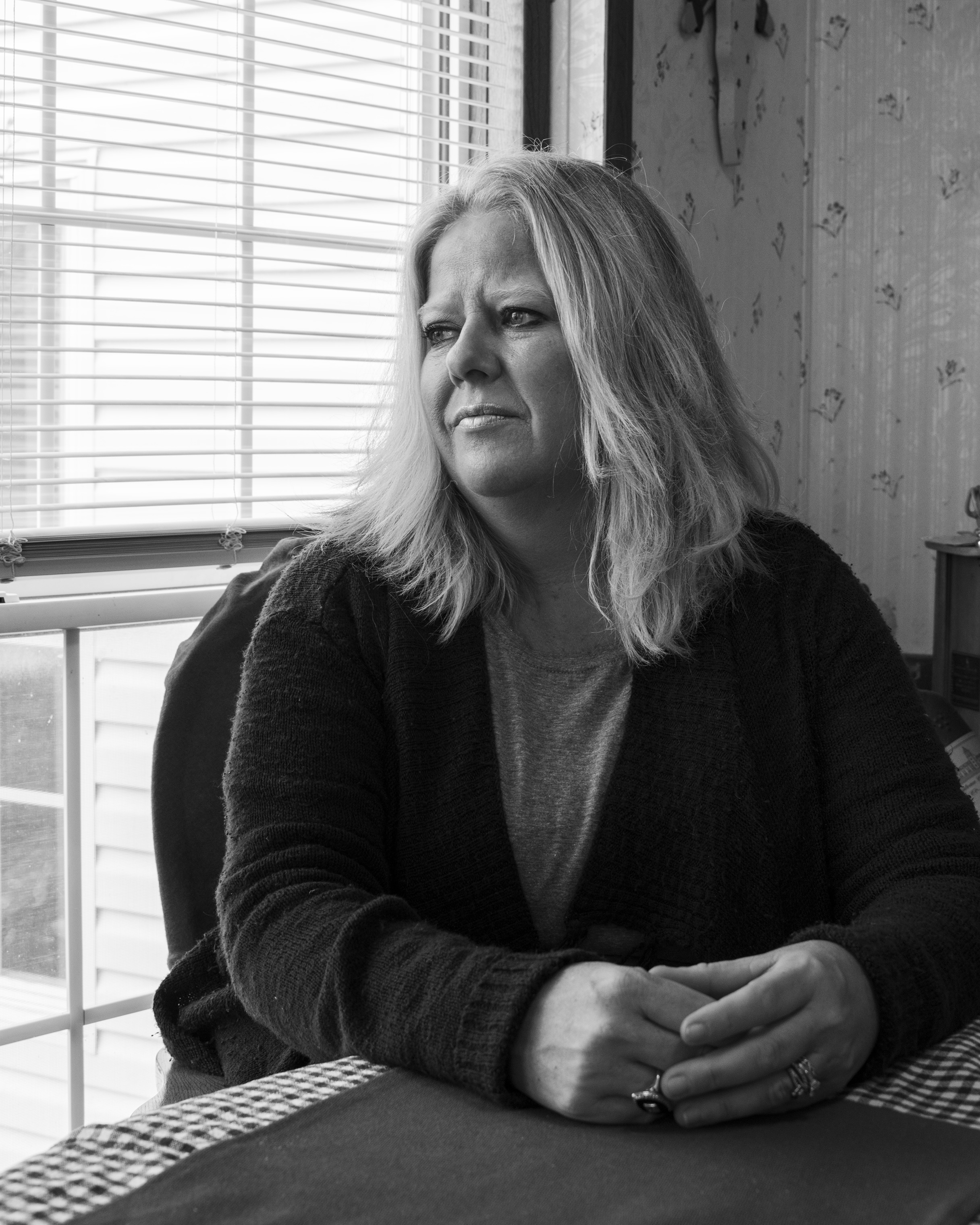 Maribeth Sheedy inside her home in the Akron Manufactured Home Community (Shane Lavalette for TIME)