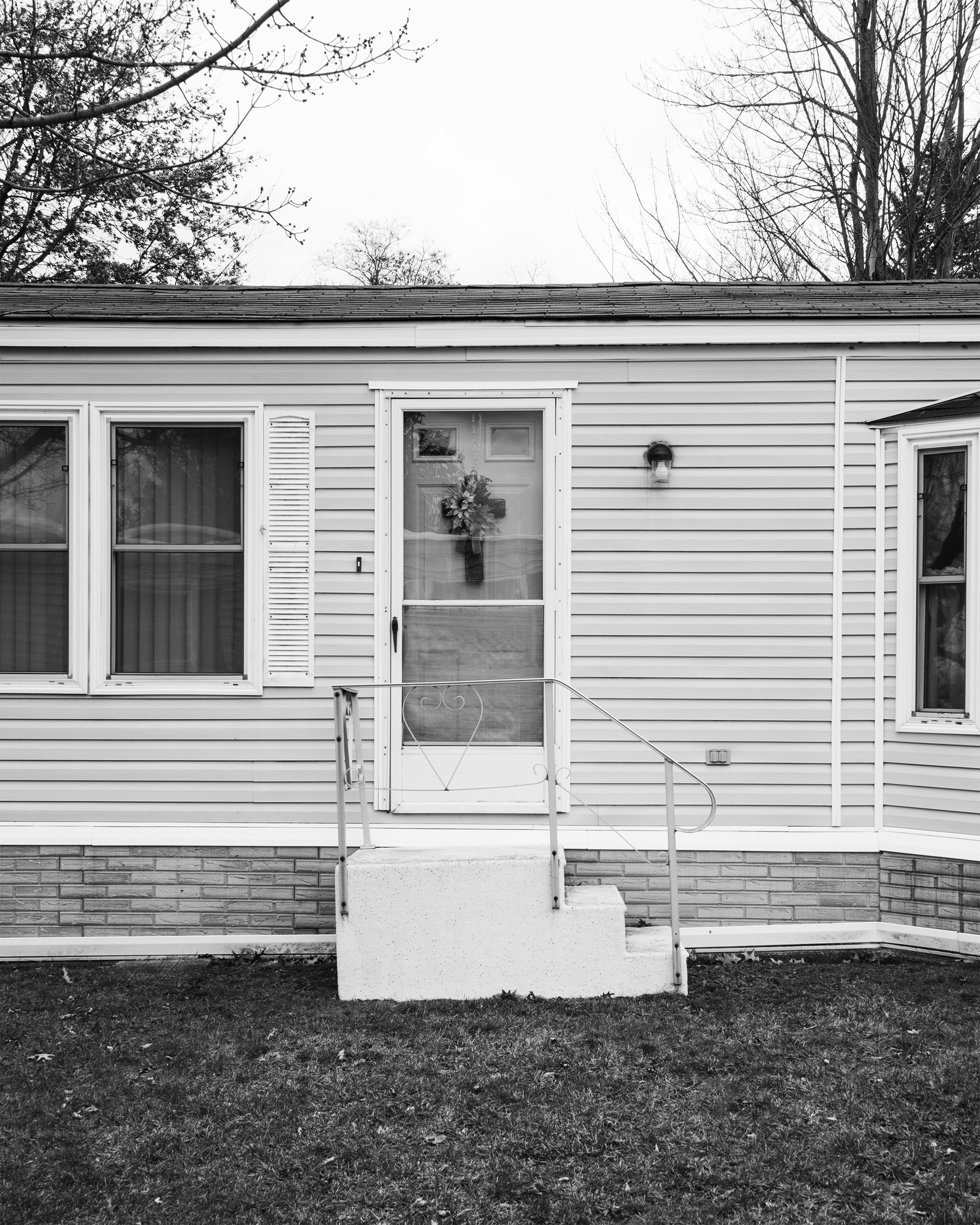 An exterior of a home in the Akron Manufactured Home Community (Shane Lavalette for TIME)