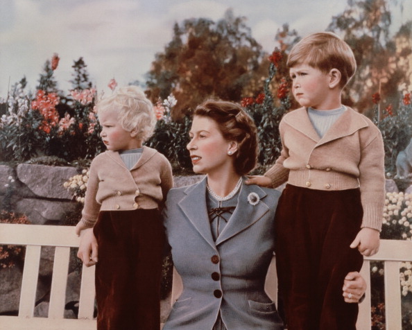Queen Elizabeth II with Prince Charles and Princess Anne in the grounds of Balmoral Castle, Scotland, in September 1952. Charles is celebrating his 4th birthday.