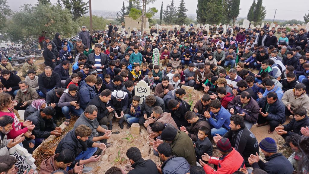 Mourners attend the funeral of Raed Fares and Hammoud al-Jneid in the village of Kafranbel in the northwestern province of Idlib on November 23, 2018. (Muhammad Haj Kadour—AFP/Getty Images)
