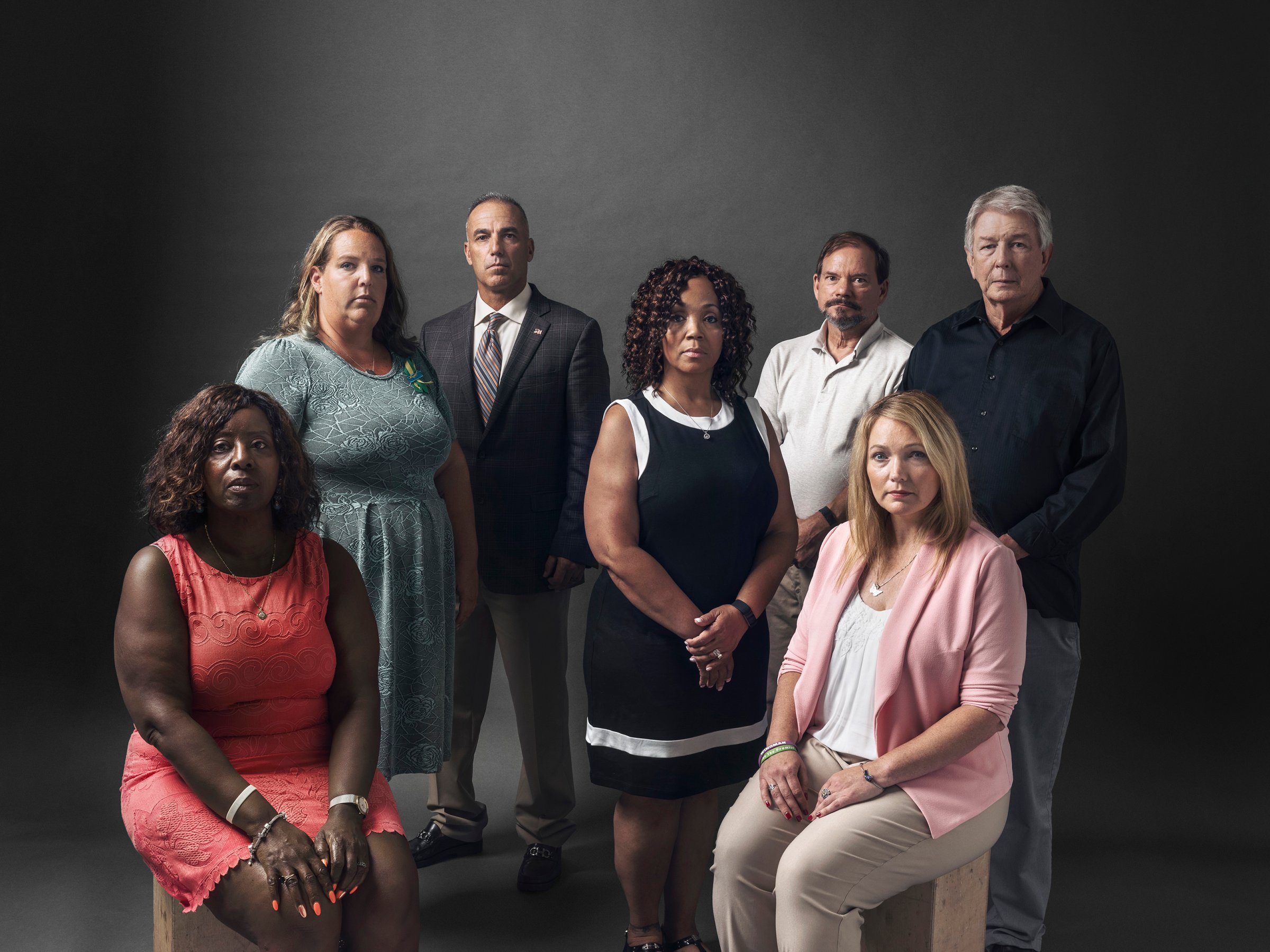 Seven parents of seven dead students. From left: Pamela Wright- Young, Melissa Willey, Andrew Pollack, Darshell Scott, Tom Mauser, Nicole Hockley and Darrell Scott