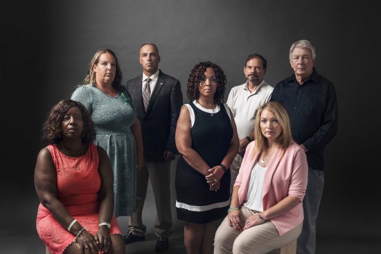 Seven parents of seven dead students. From left: Pamela Wright- Young, Melissa Willey, Andrew Pollack, Darshell Scott, Tom Mauser, Nicole Hockley and Darrell Scott