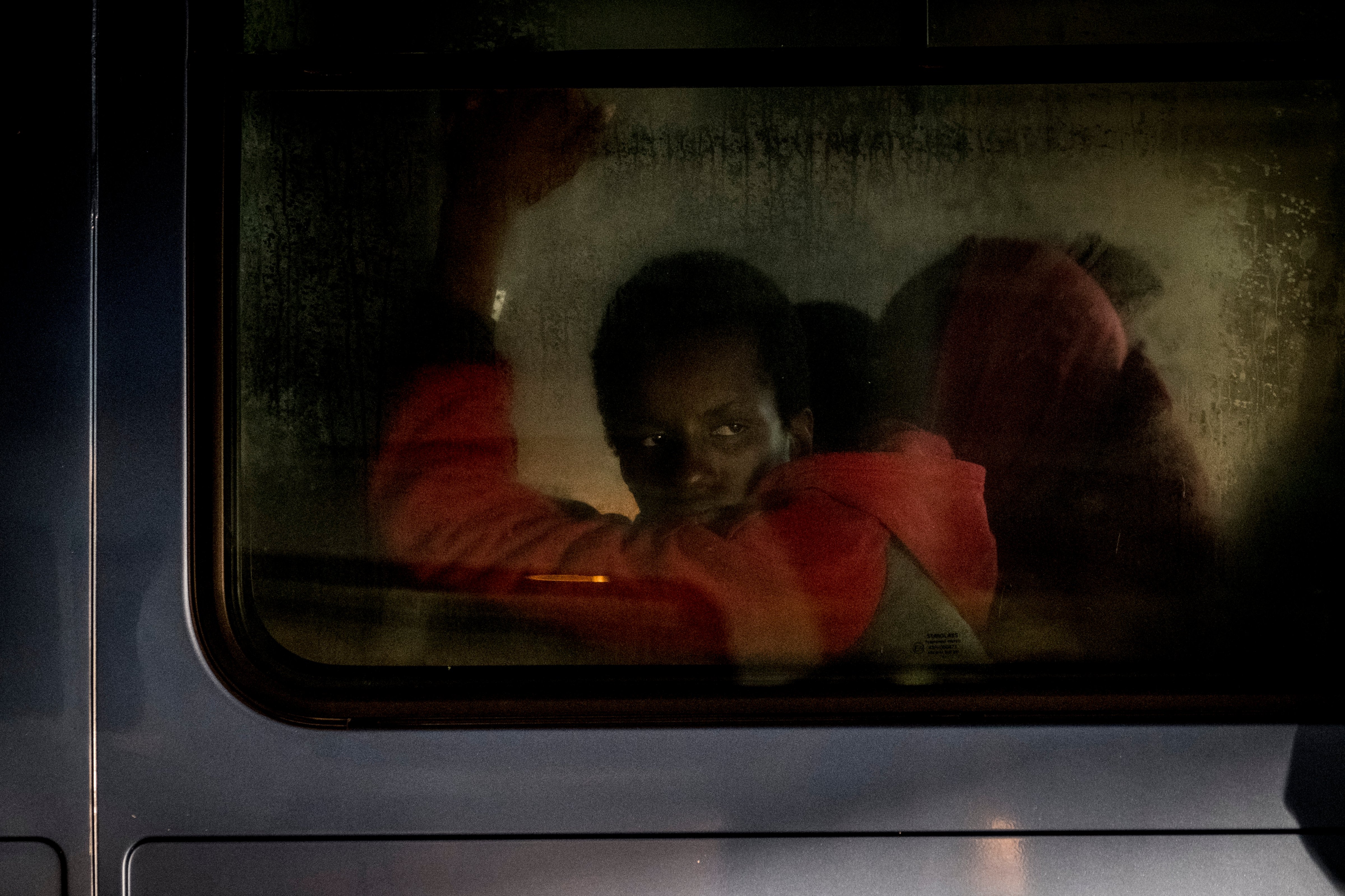 A migrant inside of a van waiting to be transferred to a center in Malaga, Spain on Nov. 22, 2018. (NurPhoto&mdash;NurPhoto via Getty Images)
