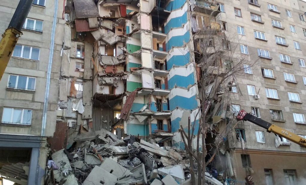 The site of an apartment building collapse. A suspected domestic gas blast caused a partial collapse of a residential building at 164 Karla Marksa Prospekt Street killing three people. (TASS/Getty Images)