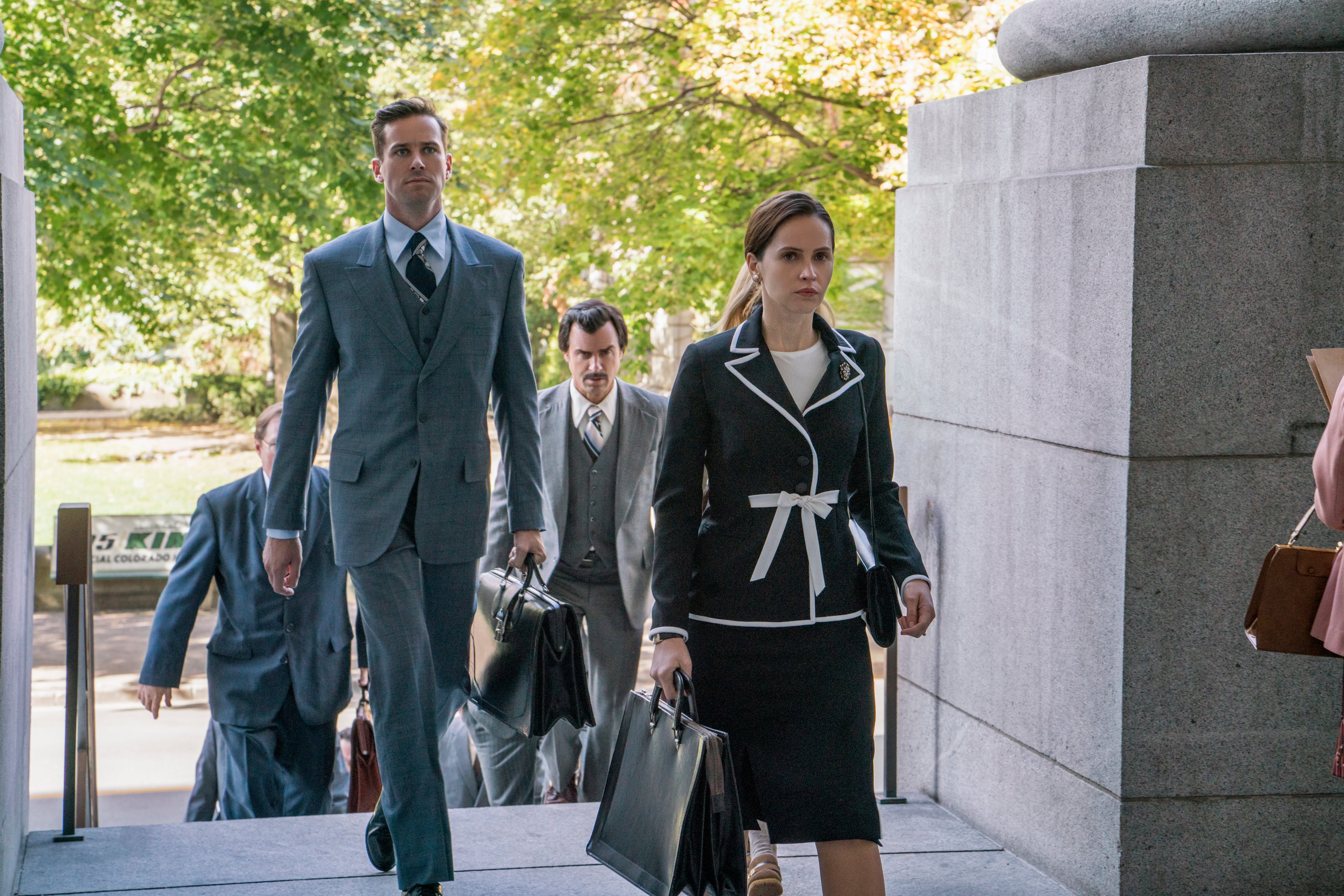 (l to r.) Armie Hammer as Marty Ginsburg, Justin Theroux as Melvin Wulf, and Felicity Jones as Ruth Bader Ginsburg star in Mimi Leder's ON THE BASIS OF SEX, a Focus Features release. (Jonathan Wenk—Focus Features)