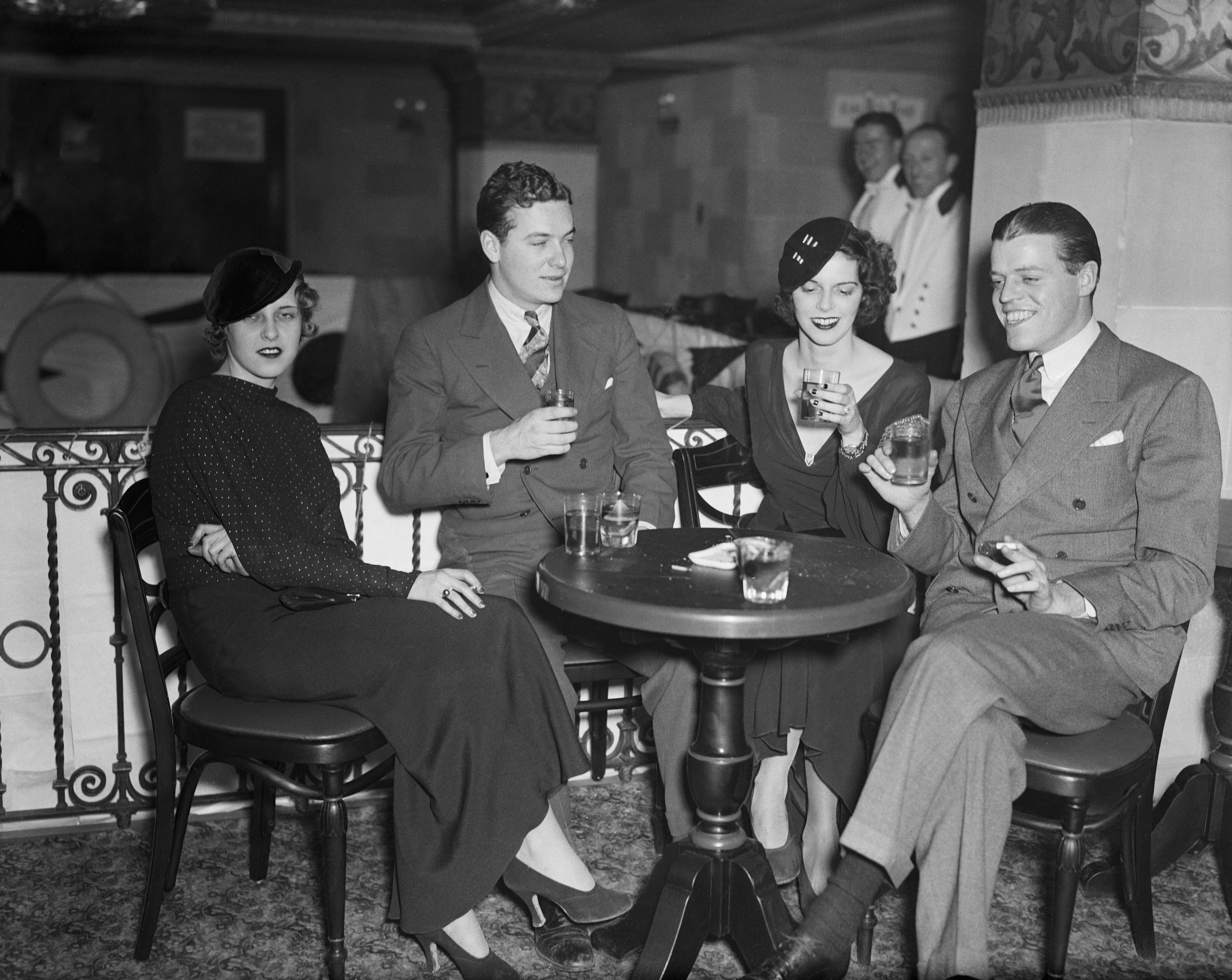 On Nov. 30, 1933, Knickerbocker society luminaries turned for Major and Mrs. S. Fullerton Weaver's Thanksgiving "Cocktail cruise" aboard the "Good Ship Park Lane Cafe." Among the "passengers" were (left to right), Miss Dorothy McElphone, Edmund Sheedy and Mr. and Mrs. G.T. Wilde. (Bettmann/Getty Images)
