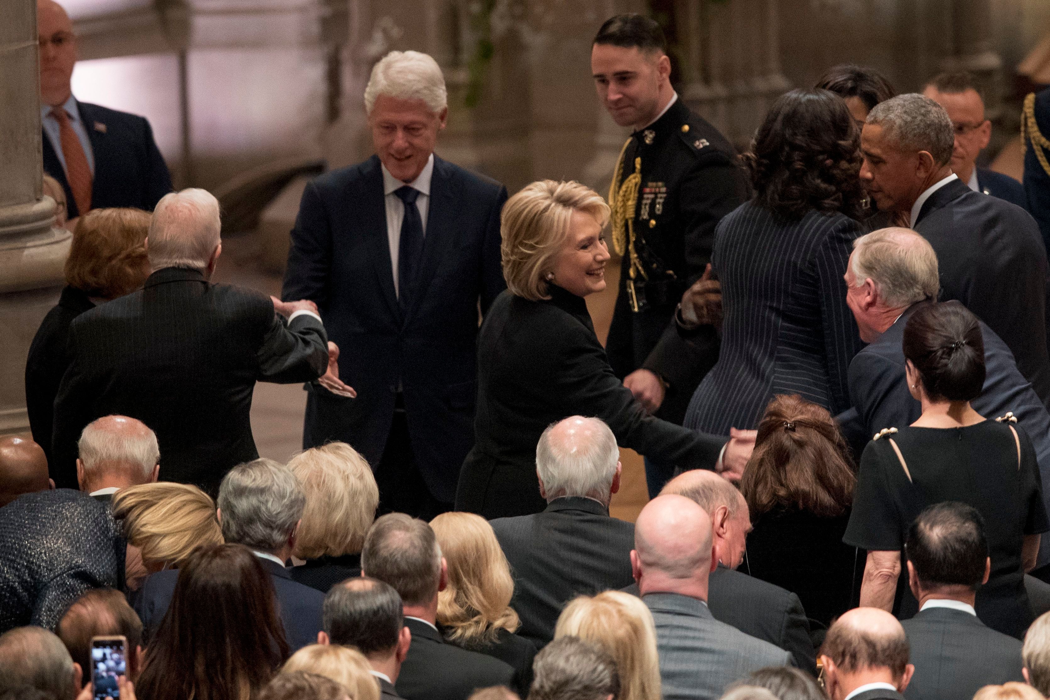 Former President Jimmy Carter, and former first lady Rosalynn Carter, greet former President Bill Clinton, as his wife, former Secretary of State Hillary Clinton, greets a guest before a State Funeral for former President George H.W. Bush at the National Cathedral, in Washington, DC on Dec. 5, 2018. (Andrew Harnik/Pool/EPA—EFE/REX/Shutterstock)