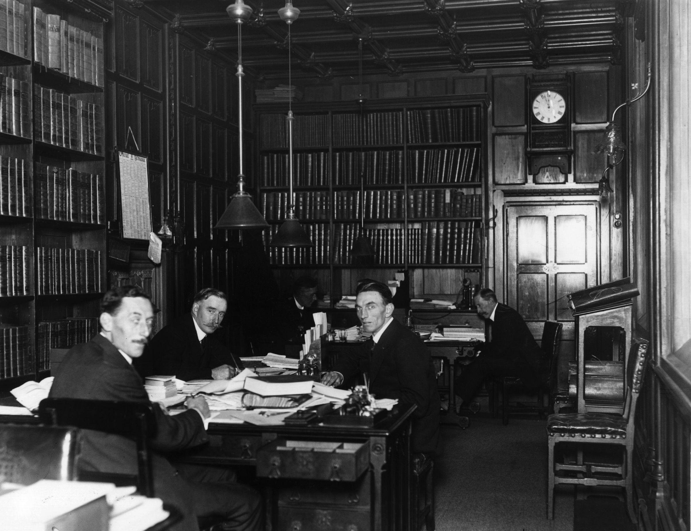 November 1919:  Men at work in the House of Commons library, London. (Topical Press Agency/Getty Images)