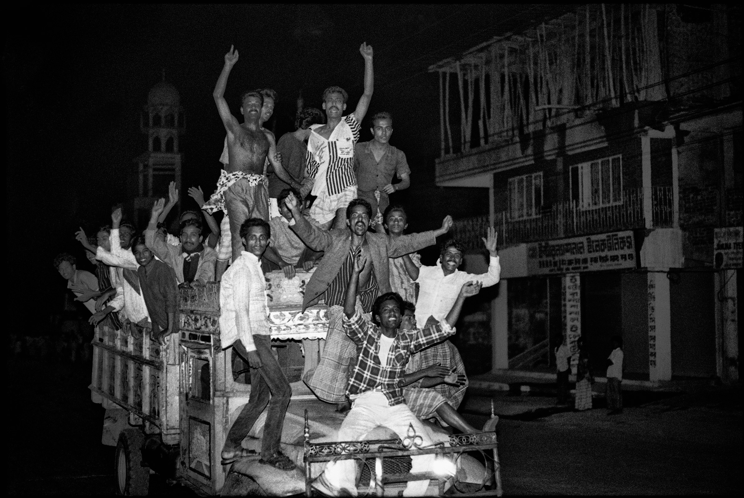 People rejoice after the fall of General Hussain Muhammad Ershad, in Dhaka, Bangladesh, December 4, 1990. (Shahidul Alam—Drik)