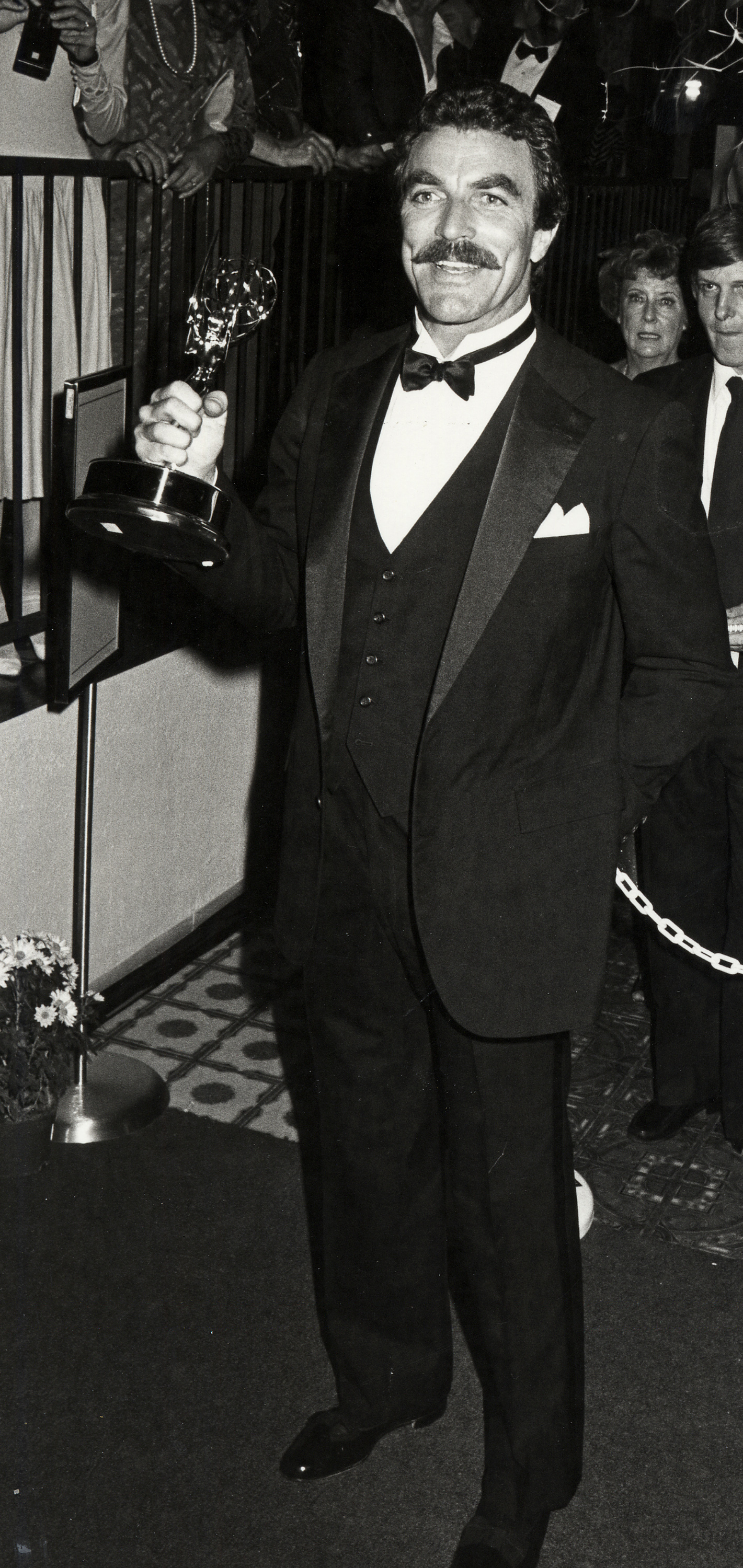 Tom Selleck at the 36th Annual Emmy Awards with his winning trophy. (Ron Galella, Ltd.—WireImage)
