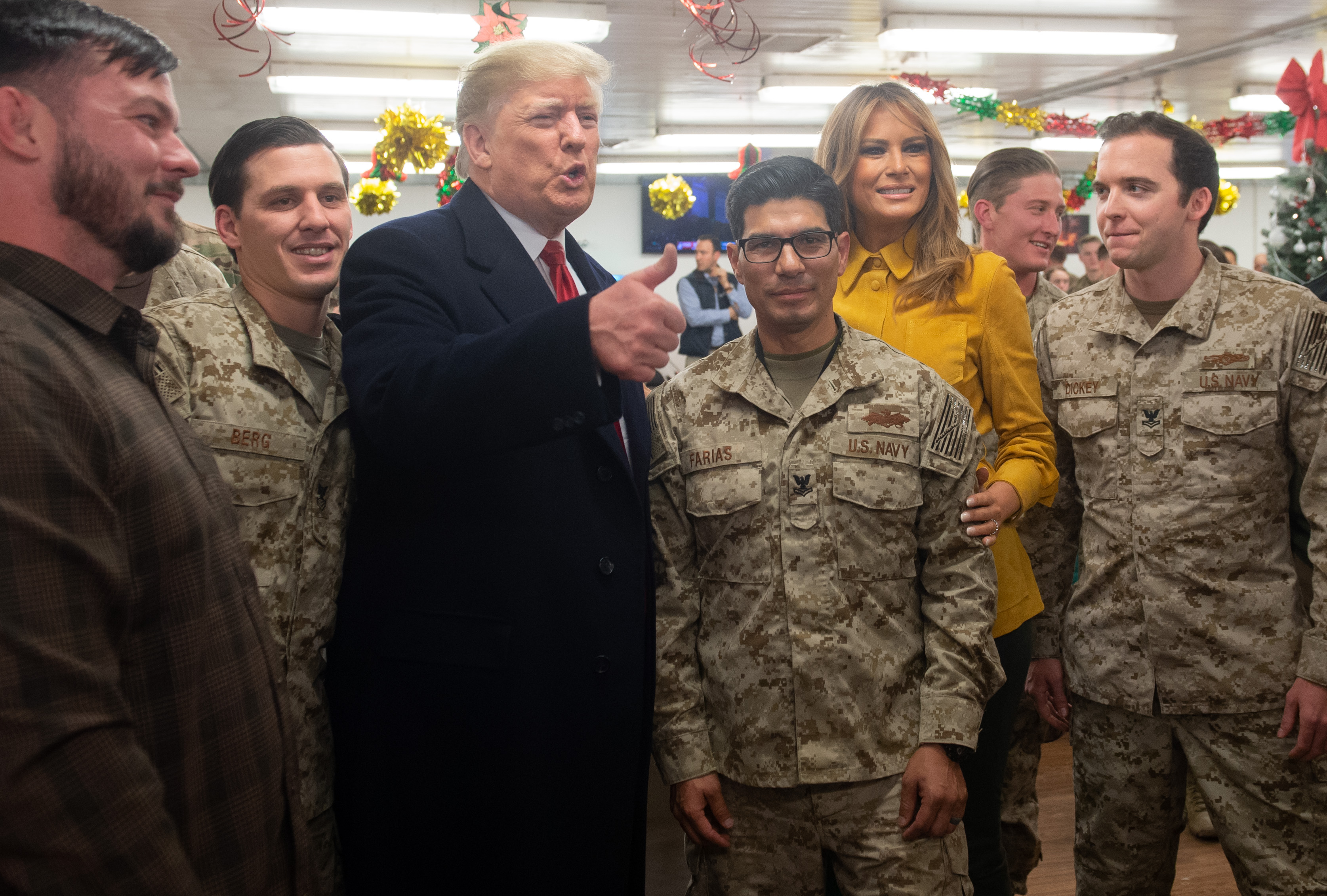 President Donald Trump and First Lady Melania Trump greet members of the US military during an unannounced trip to Al Asad Air Base in Iraq on December 26, 2018. (SAUL LOEB—AFP/Getty Images)