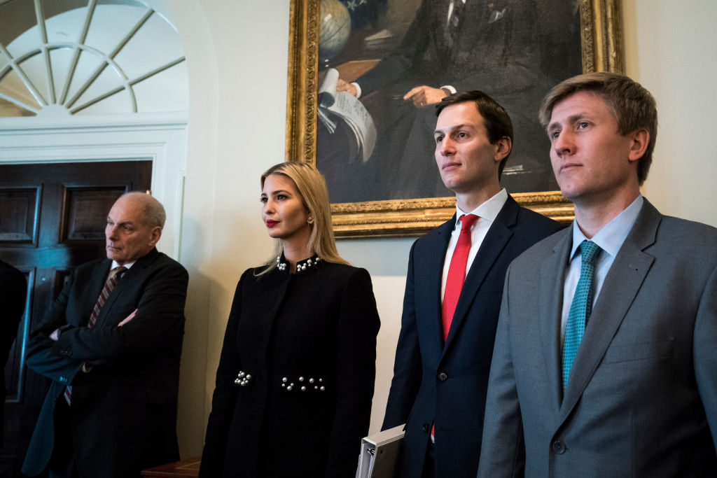 In this March 8, 2018 file photo, White House Chief of Staff John Kelly, Ivanka Trump, White House senior adviser Jared Kushner, and Vice President Mike Pence's chief of staff Nick Ayers, listen as President Donald Trump speaks during a cabinet meeting in Washington, DC. (Jabin Botsford—The Washington Post/Getty Images)