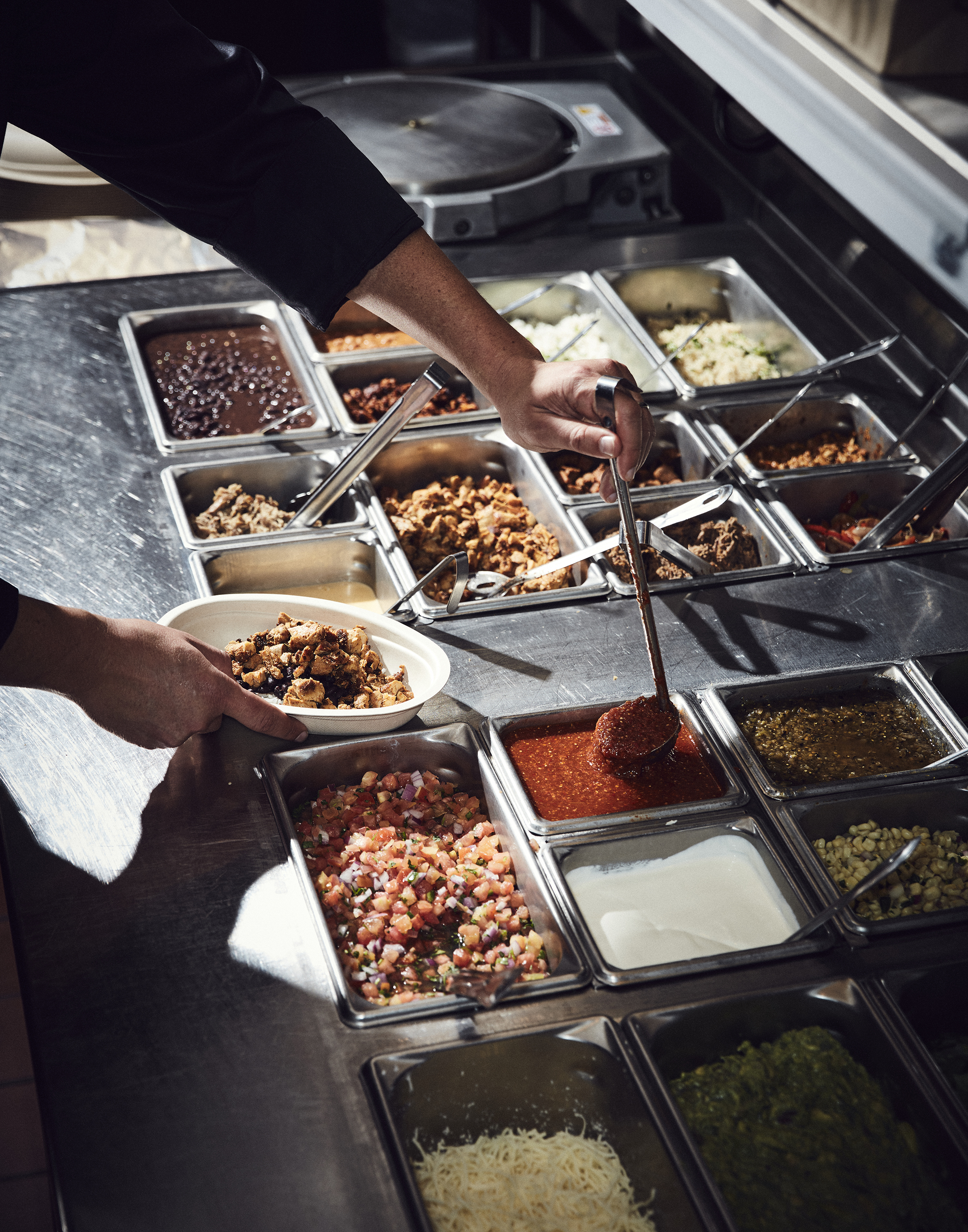 Chipotle is testing new menu items, like nachos, quesadillas and avocado tostadas, that may soon be served alongside burrito bowls. (Shaughn and John for TIME)