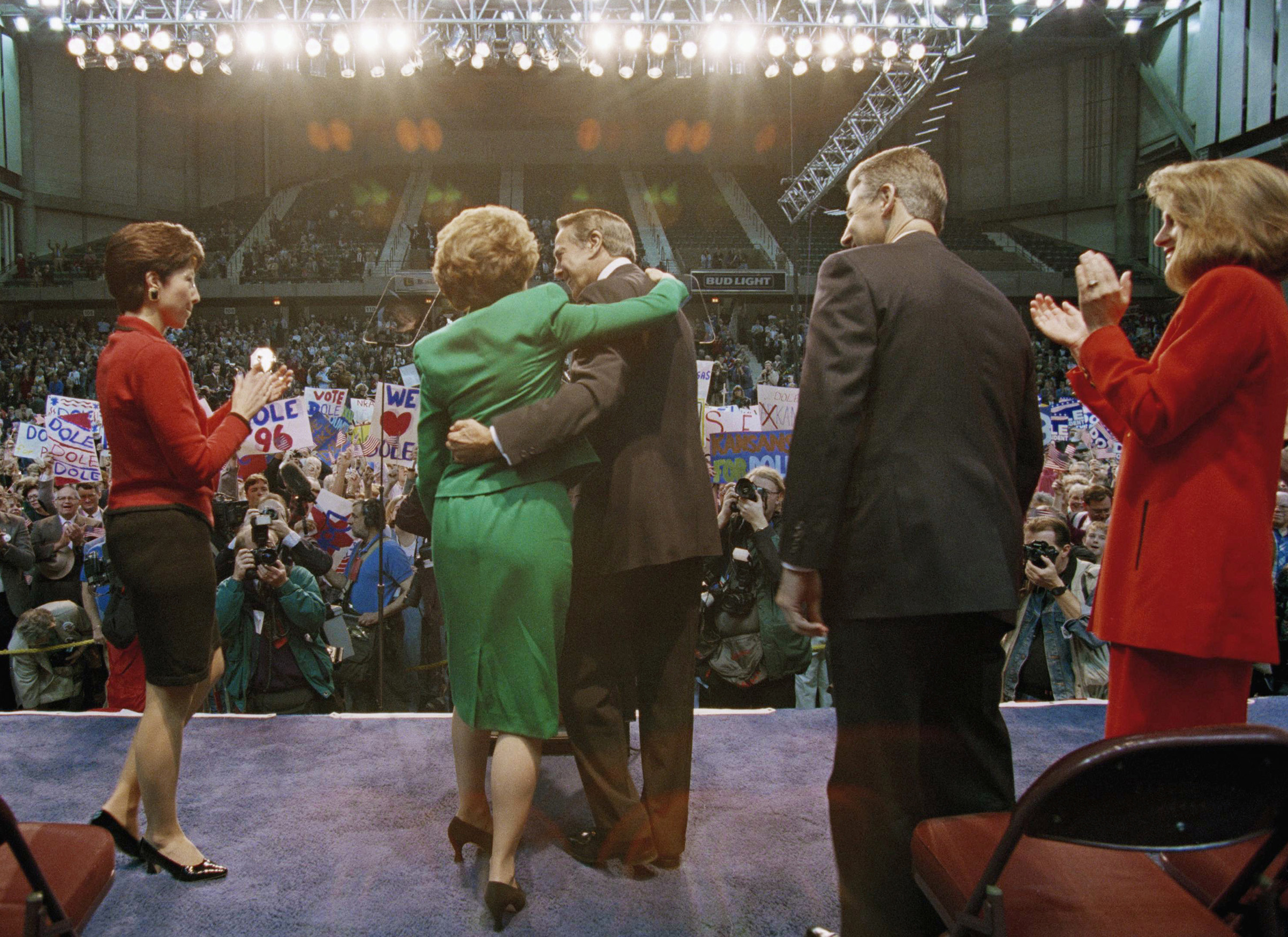 Sen. Bob Dole hugs his wife, Elizabeth, after announcing he is running for president on the Republican ticket on April 10, 1995, in Topeka, Kan. (Doug Mills—AP)