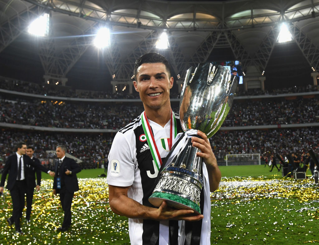 Cristiano Ronaldo of Juventus holds the Italian supercup trophy after winning the match agains AC Milan