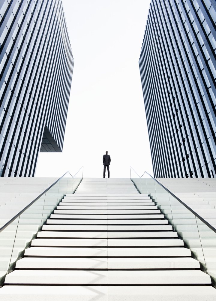 Man standing on top of stairs
