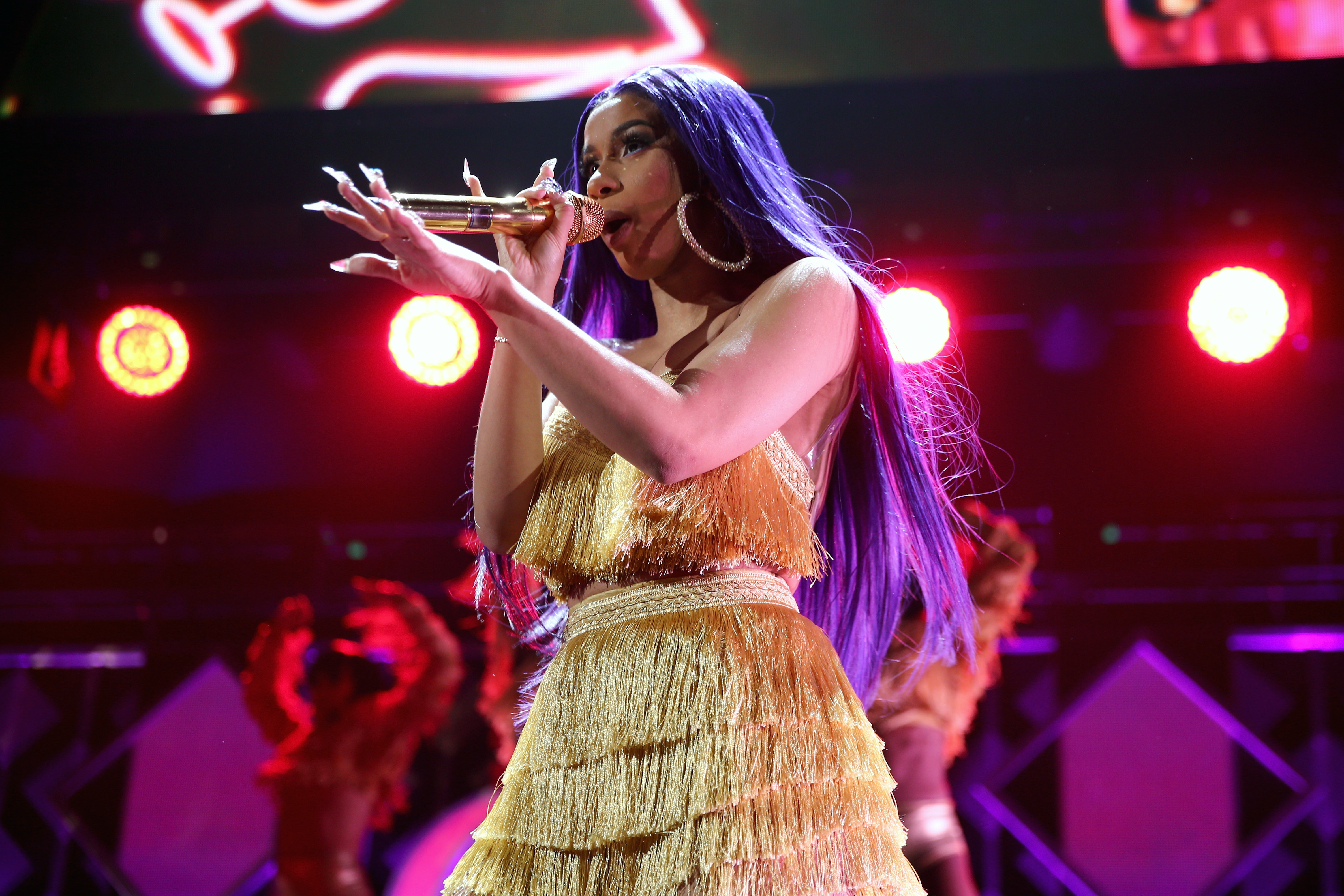 Cardi B performs onstage on Nov. 30, 2018 in Inglewood, California. (Rich Fury—iHeartMedia/Getty Images)
