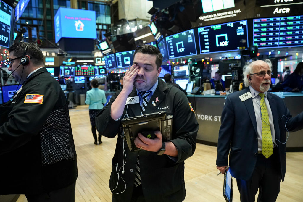 Traders and financial professionals work ahead of the closing bell on the floor of the New York Stock Exchange (NYSE), Dec. 27, 2018 in New York City (Drew Angerer—Getty Images)