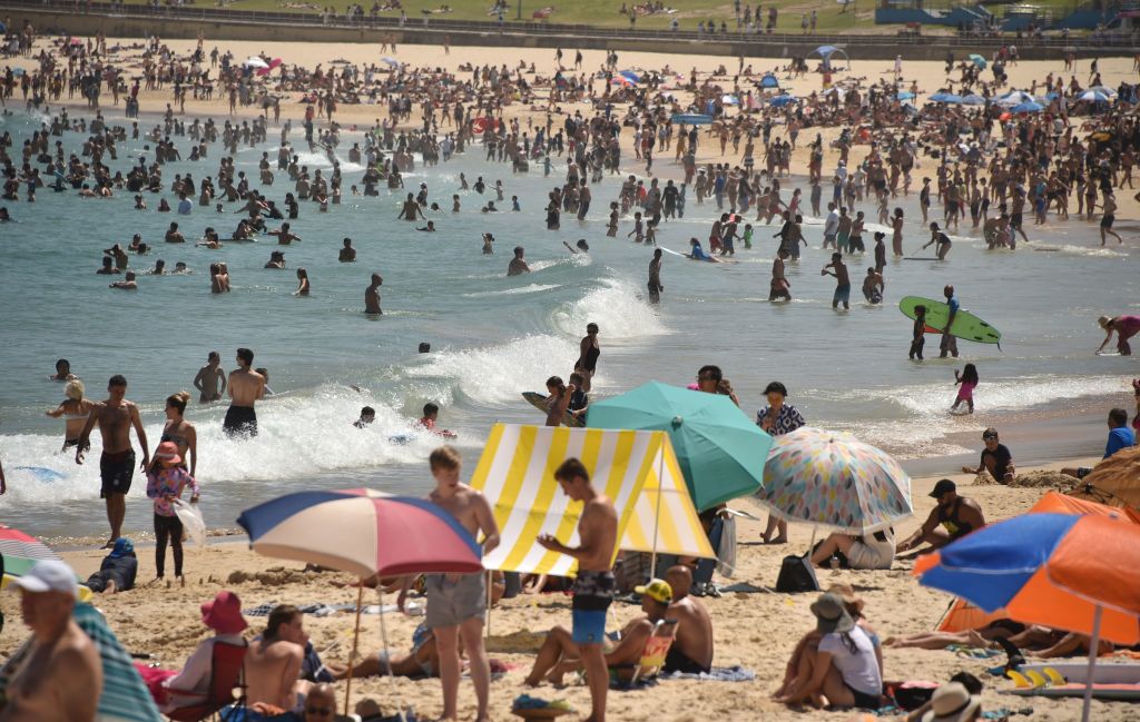 Sunbathers are seen on Bondi Beach as temperatures soar in Sydney on Dec. 28, 2018. (Peter Parks—AFP/Getty Images)