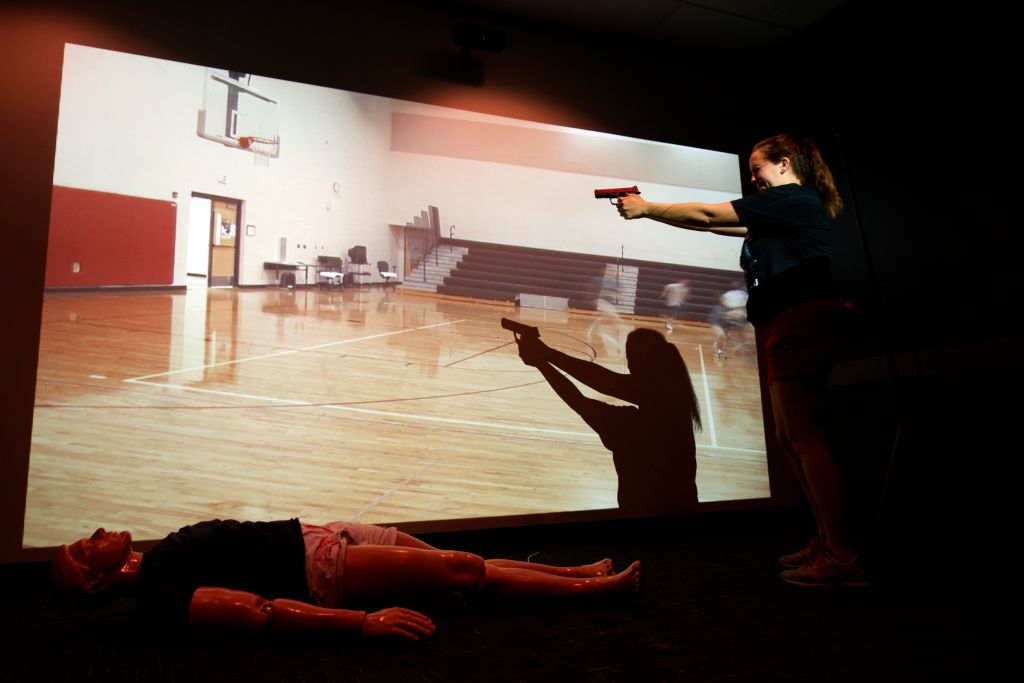 A teacher takes part in an active shooter drill during a firearms course for teachers and administrators in Commerce City, Colorado on June 28, 2018. (Jason Connolly—AFP/Getty ImagesA)