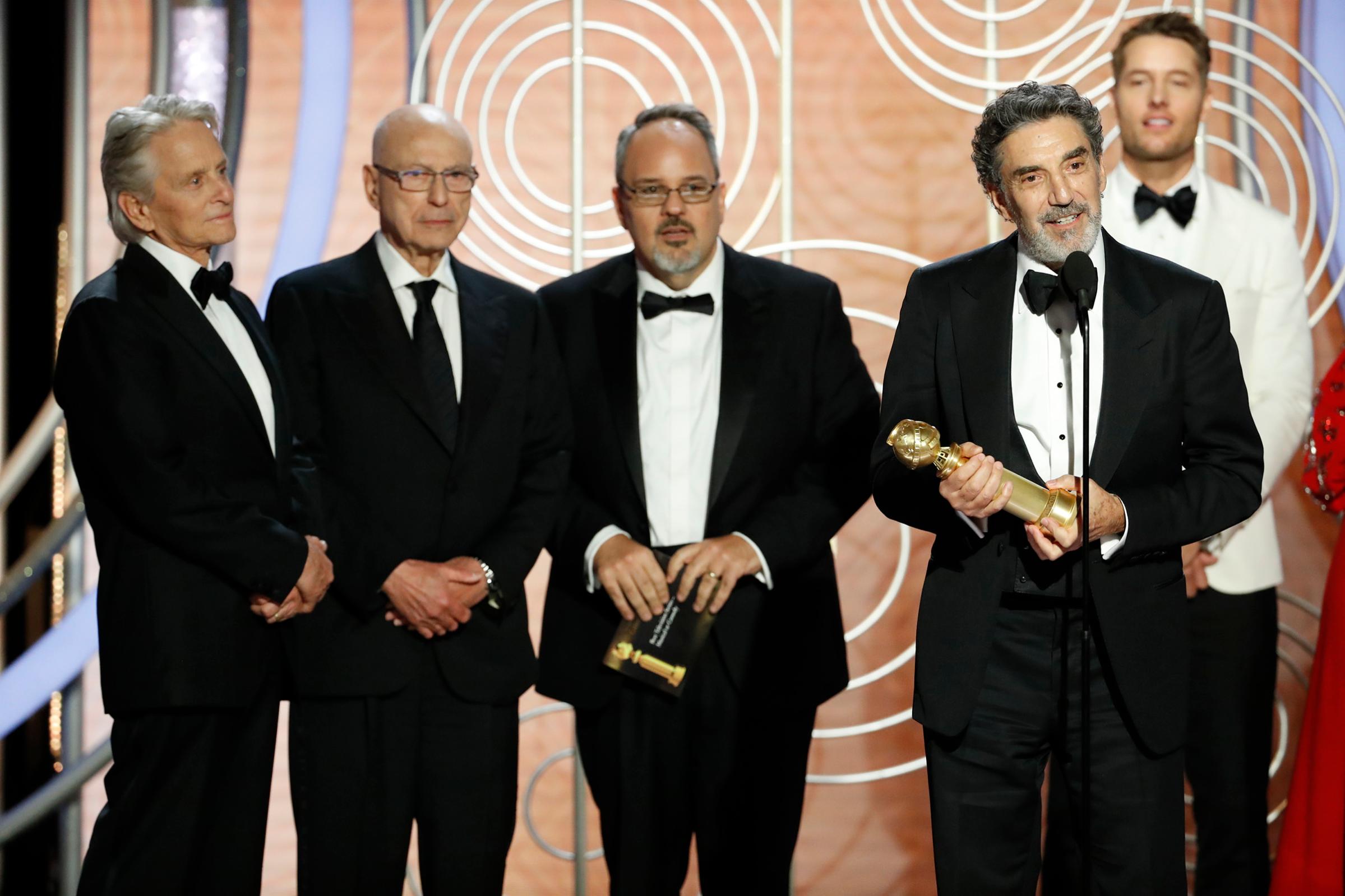 Chuck Lorre and Al Higgins of “The Kominsky Method” accept the Best Television Series – Musical or Comedy award onstage during the 76th Annual Golden Globe Awards.