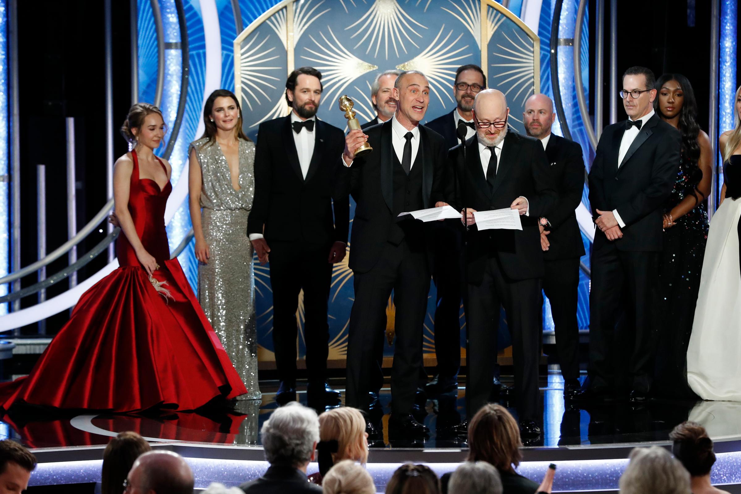 Joe Weinberg (R) from “The Americans” accept the Best Television Series – Drama award onstage during the 76th Annual Golden Globe Awards.