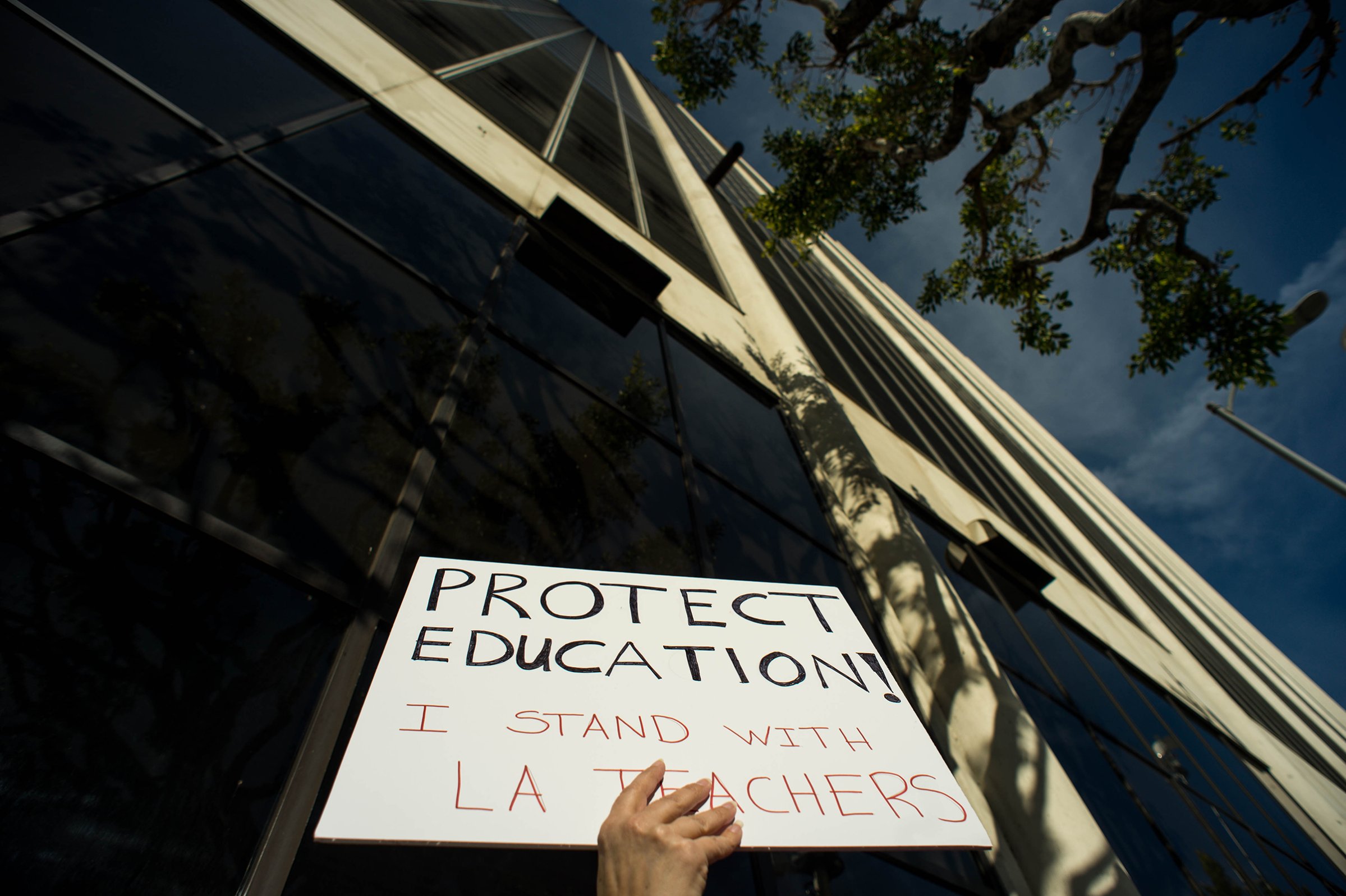"I'm advocating for my children and I believe in what the teachers are asking for will benefit my children so I support my teachers," says Los Angeles Unified School District parent Kristie Vogel as she waits to get into the LAUSD School Board meeting in Los Angeles on Tuesday, January 8, 2019.