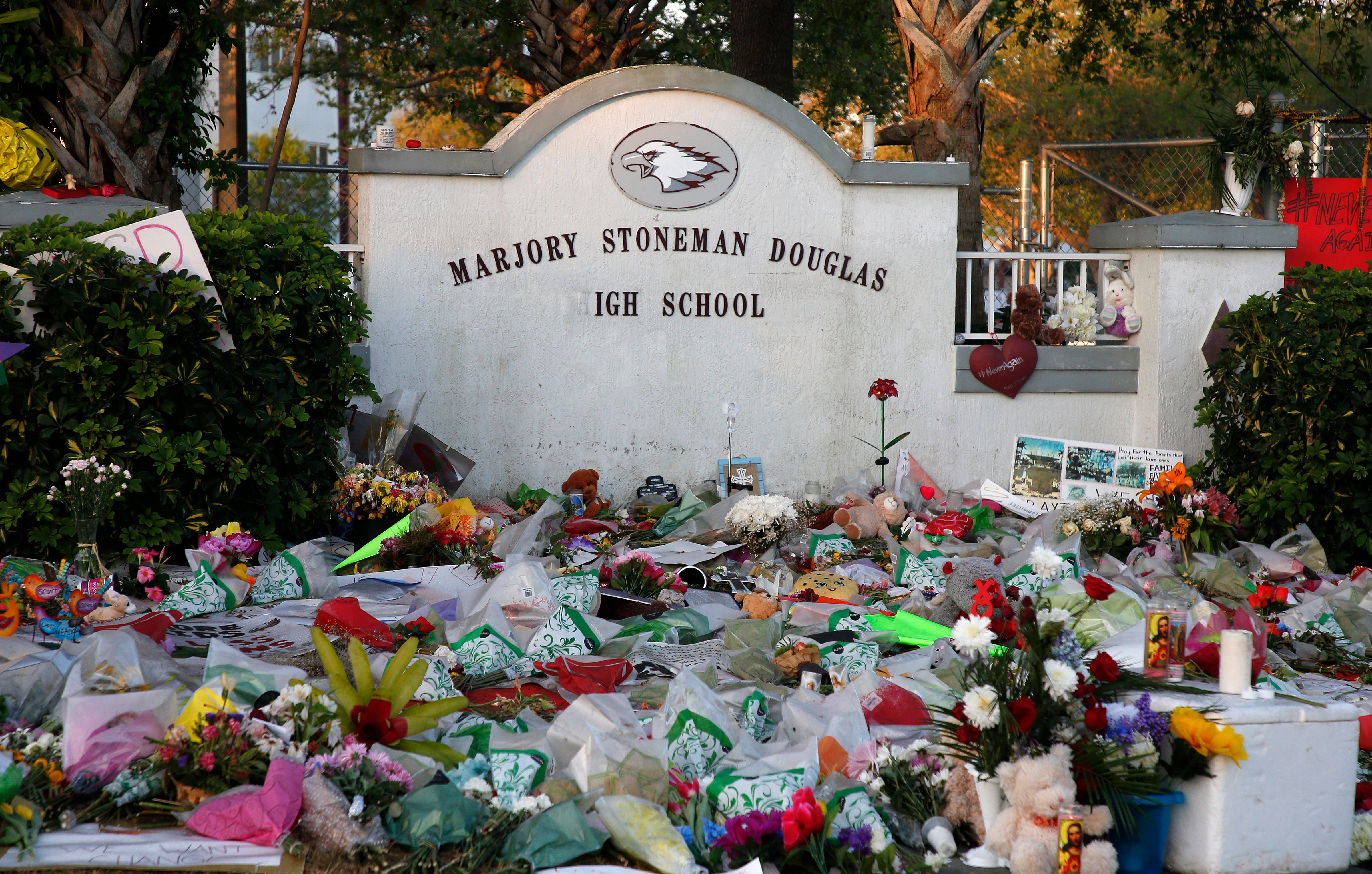 Flowers, candles and mementos sit outside one of the makeshift memorials at Marjory Stoneman Douglas High School in Parkland, Florida on February 27, 2018. (Rhona Wise—AFP/Getty Images)