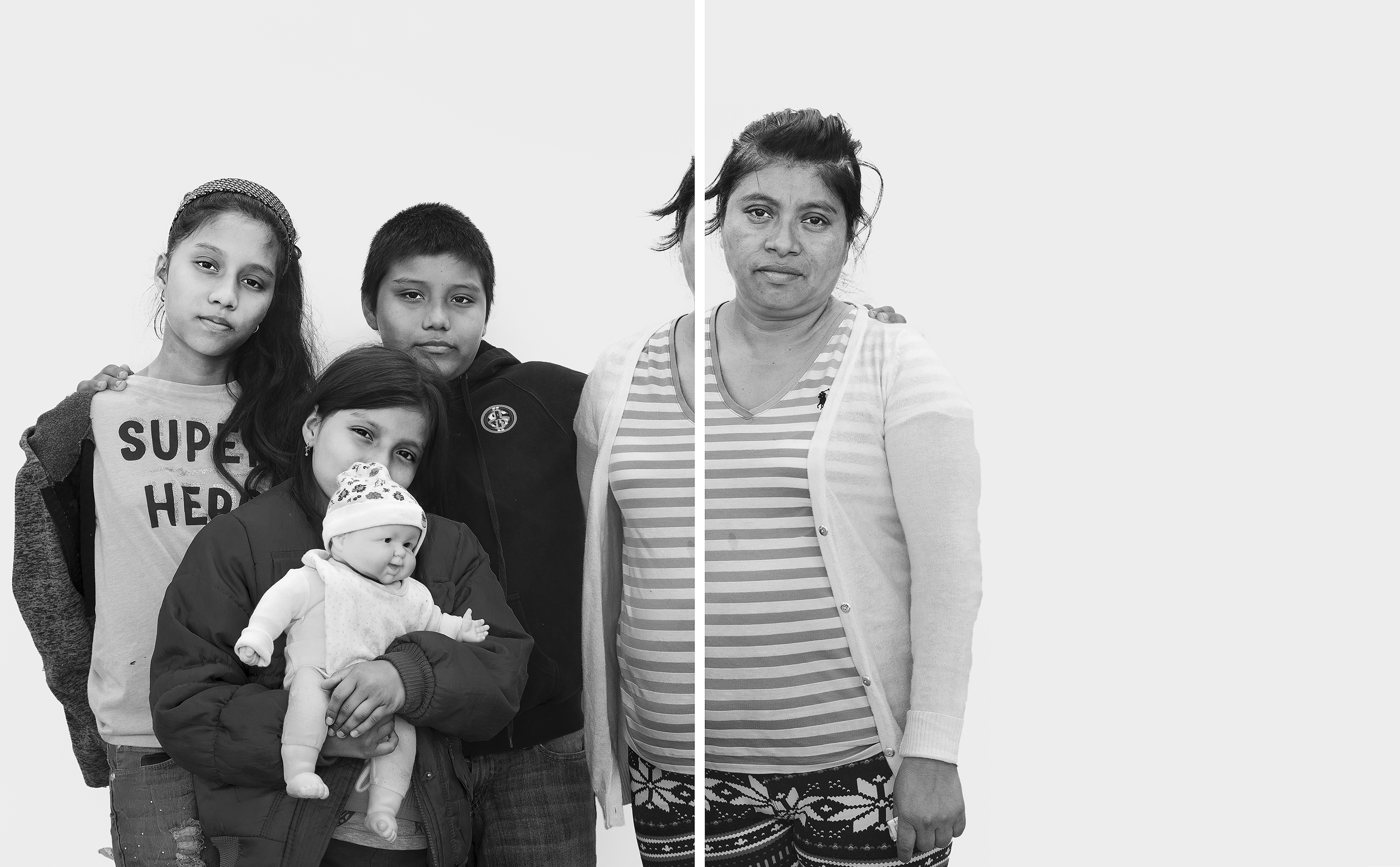 Violeta Monterroso, 42, and her children, Kenia, 12; Isaac, 11; and Yeimi, 9. Monterroso fled Guatemala in mid-October 2018 with her husband, Cándido Calderón, 42. Gang members threatened to kill Calderón and Monterroso’s children if they did not pay roughly $1,200—the equivalent of five months’ income from the family’s juice stall. (Davide Monteleone for TIME)