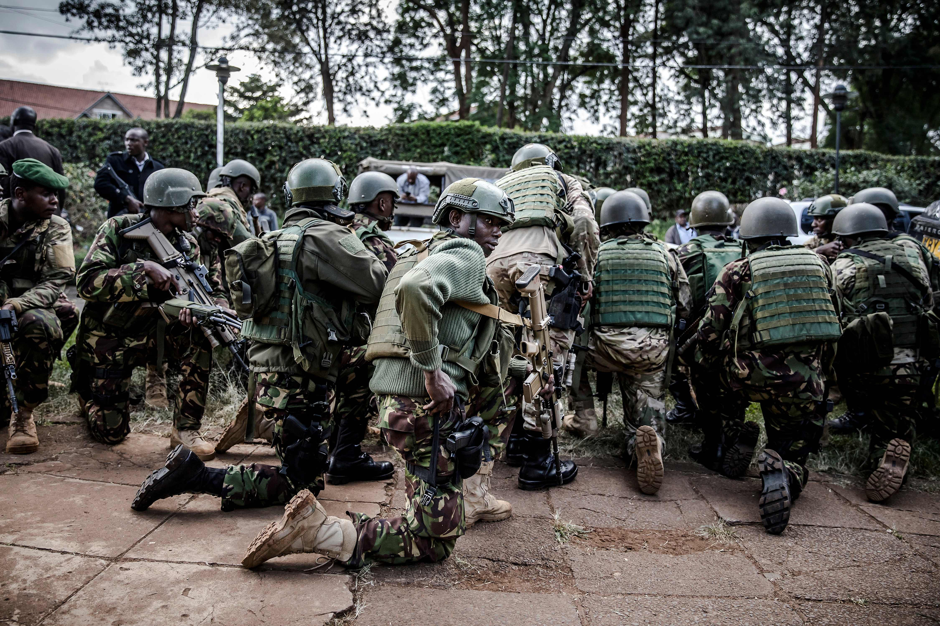 Kenyan special forces take position outside a hotel complex. (Luis Tato—AFP/Getty Images)
