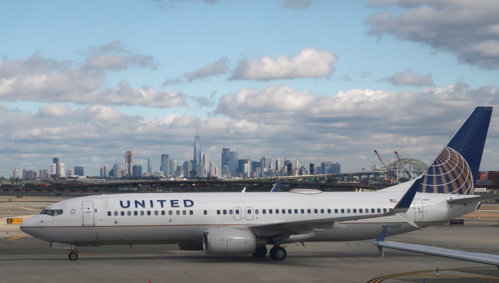 NEWARK, NJ - OCTOBER 13: A United Airlines plan at Newark Liberty International Airport (A United Airlines airplane makes its way to a gate in front of the skykine of New York City at Newark Liberty Airport on October 13, 2018 in Newark, New Jersey.)
