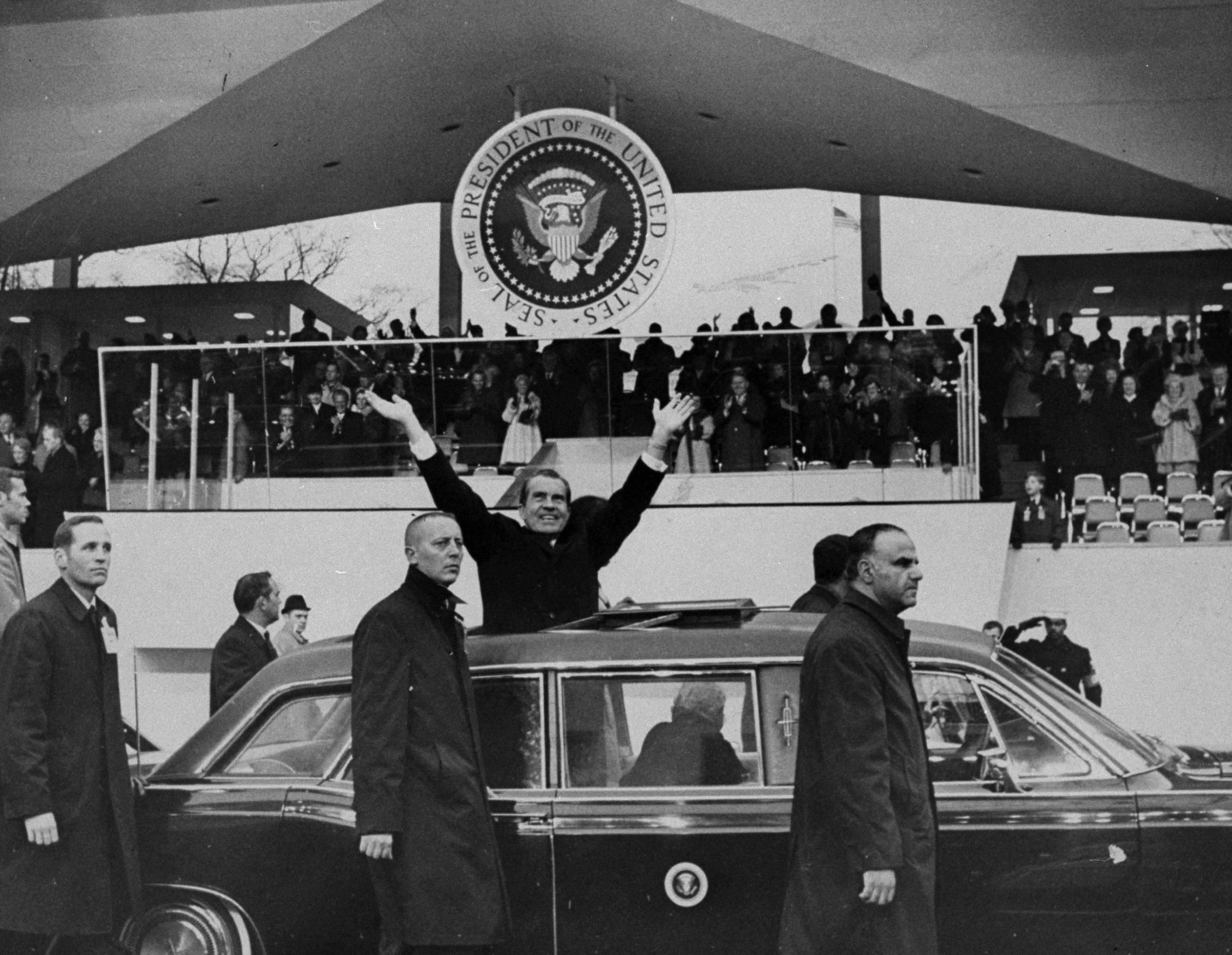 President Richard Nixon stands in car during the inaugural parade on Jan. 20, 1969. (New York Daily News Archive/Getty Images)