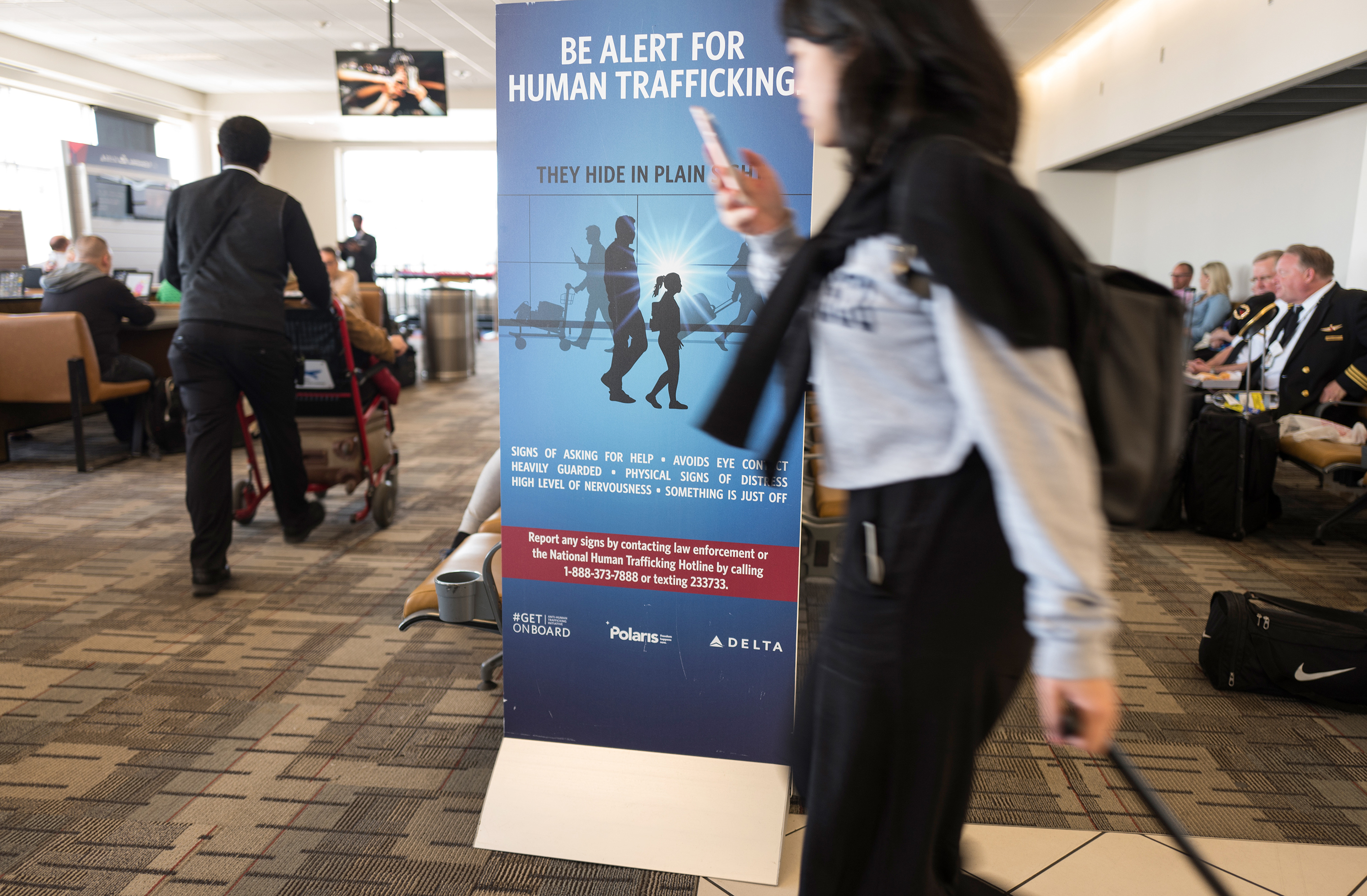 A human trafficking awareness sign in the airport in Minneapolis, MN, April 26, 2018. (Lynsey Addario for TIME)