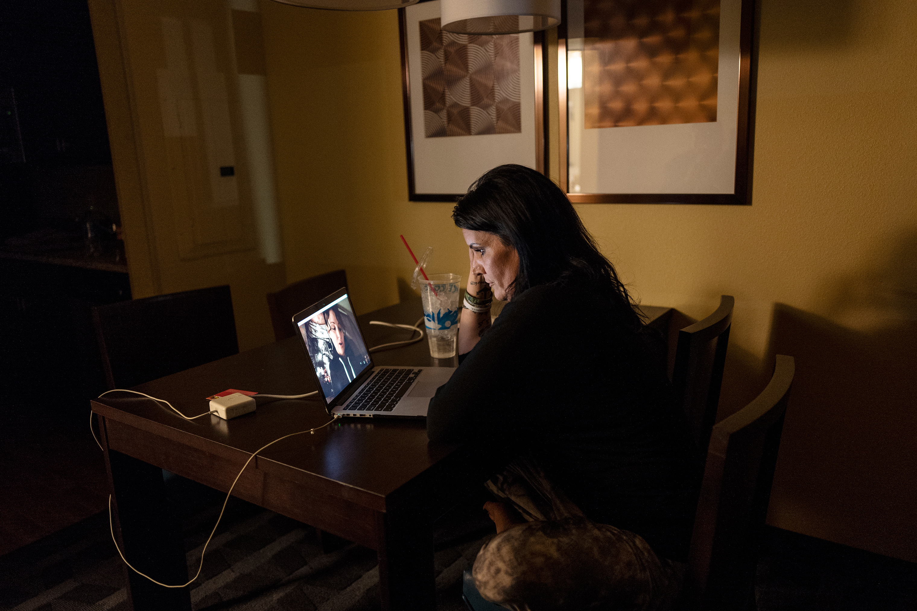 From her hotel room in North Dakota, Lazenko speaks with Adale, a human trafficking survivor in Utah, over Skype. Lazenko spends hours every day remotely helping women all over the US. (Lynsey Addario for TIME)