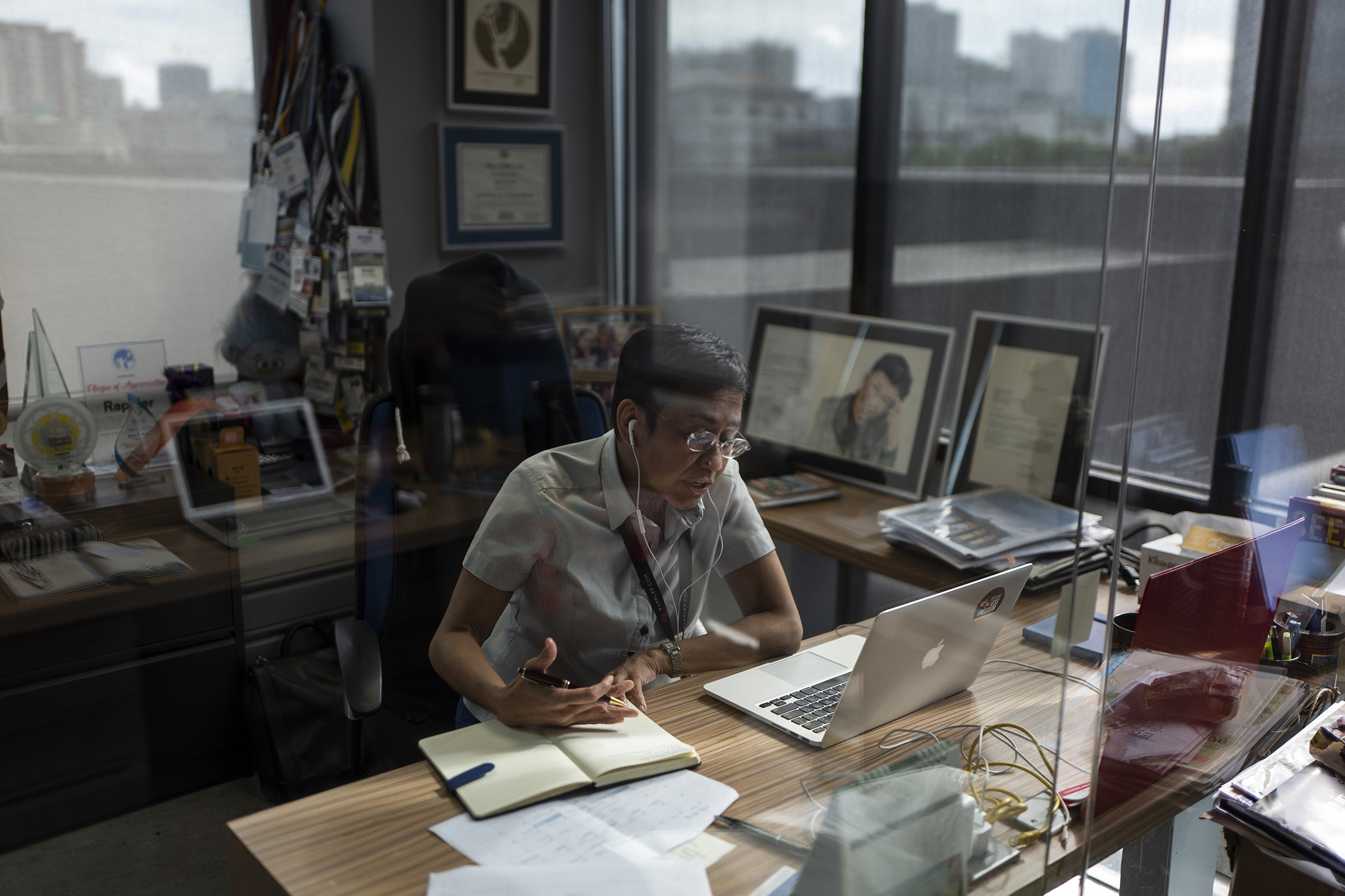 The writer in her office at Rappler in Manila (Jes Aznar—The New York Times/Redux)