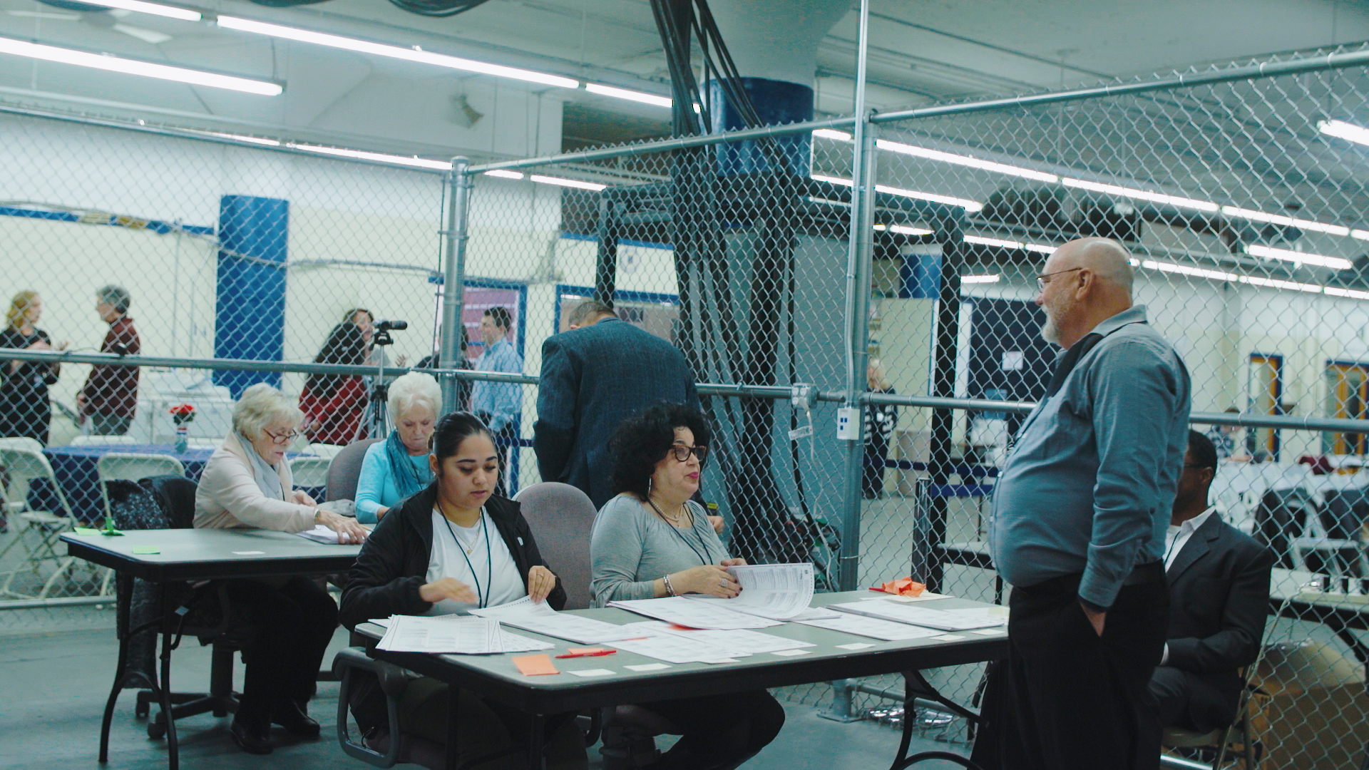 Rhode Island elections staffers count ballots as part of the state's pilot risk-limiting audit at the Board of Elections warehouse in Providence on Jan. 16. ((Sky Sabin—Sky Sabin Productions LLC))