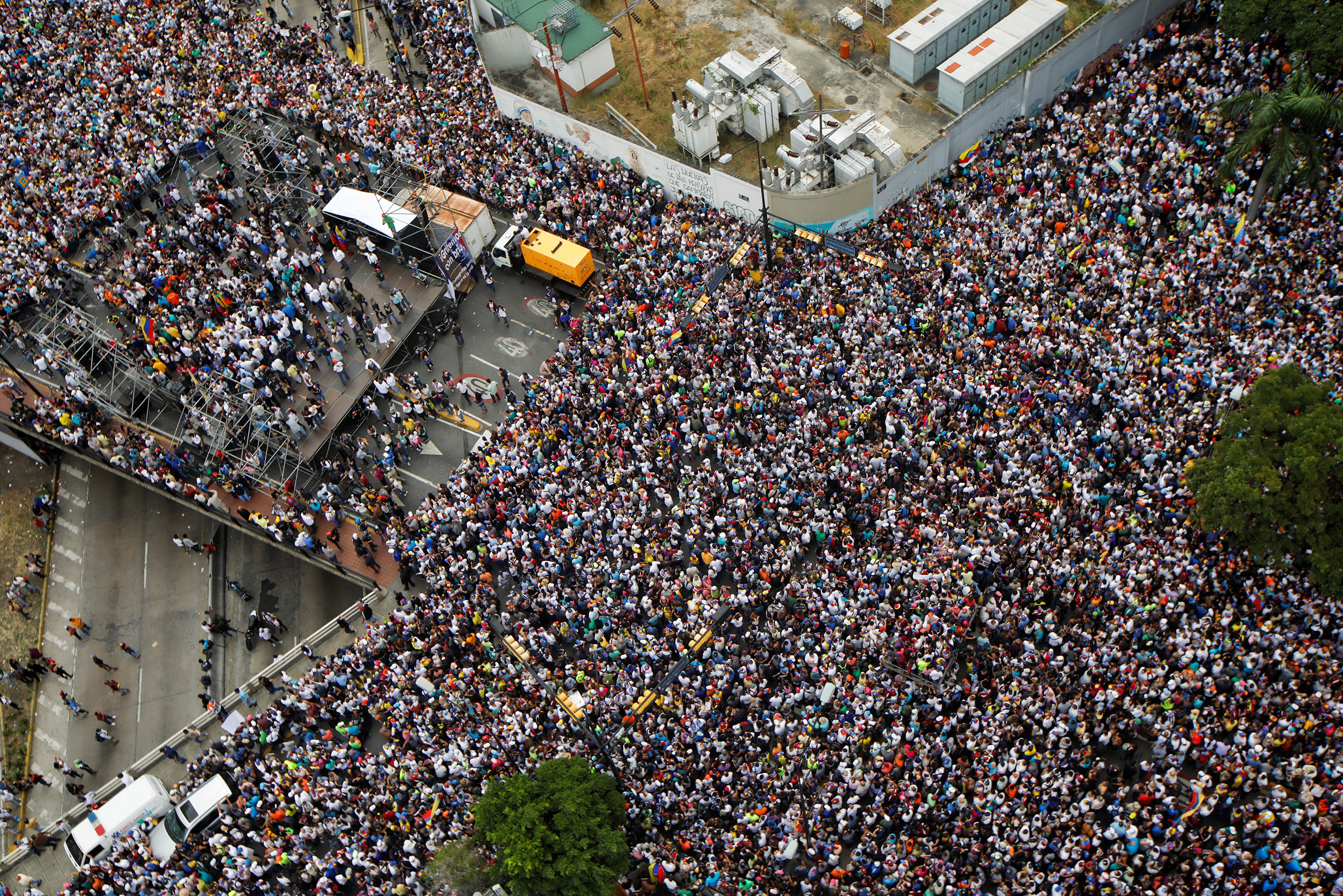 Opposition supporters during a rally against President Nicolas Maduro's government and to commemorate the 61st anniversary of the end of the dictatorship of Marcos Perez Jimenez in Caracas on Jan. 23, 2019. (Adriana Loureiro—Reuters)