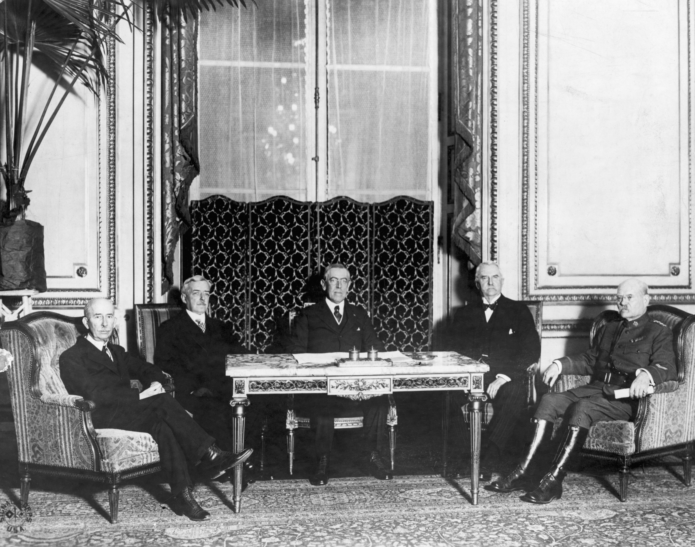 The American delegation at the Versailles Conference. From left to right--House, Lansing, Wilson, Henry White, Gen. Bliss. Undated photograph. (Bettmann/Getty Images)