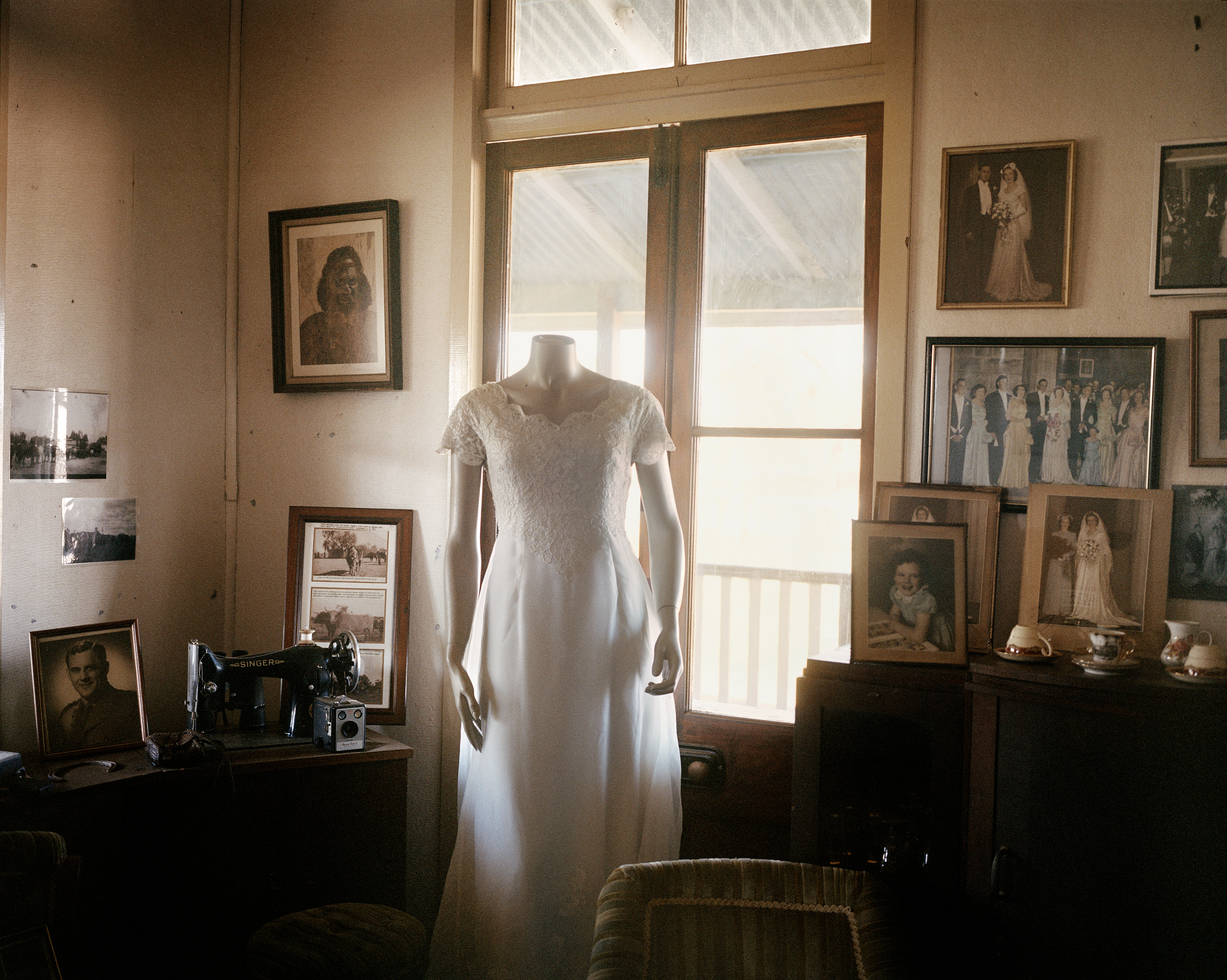 The wedding dress of Robyn Russell, 72, at her home on Charlotte Plains in Queensland in November. Russell lives and works her 69,000-acre property alone after her husband died of a brain tumor in 2011. Due to the drought, she describes herself "sliding into debt." In 2001 she had 8,000 sheep but she has since destocked to a current 3,800. To supplement her farm income, she has established a tourism business on her property with historical tours and farm stays. (Adam Ferguson for TIME)