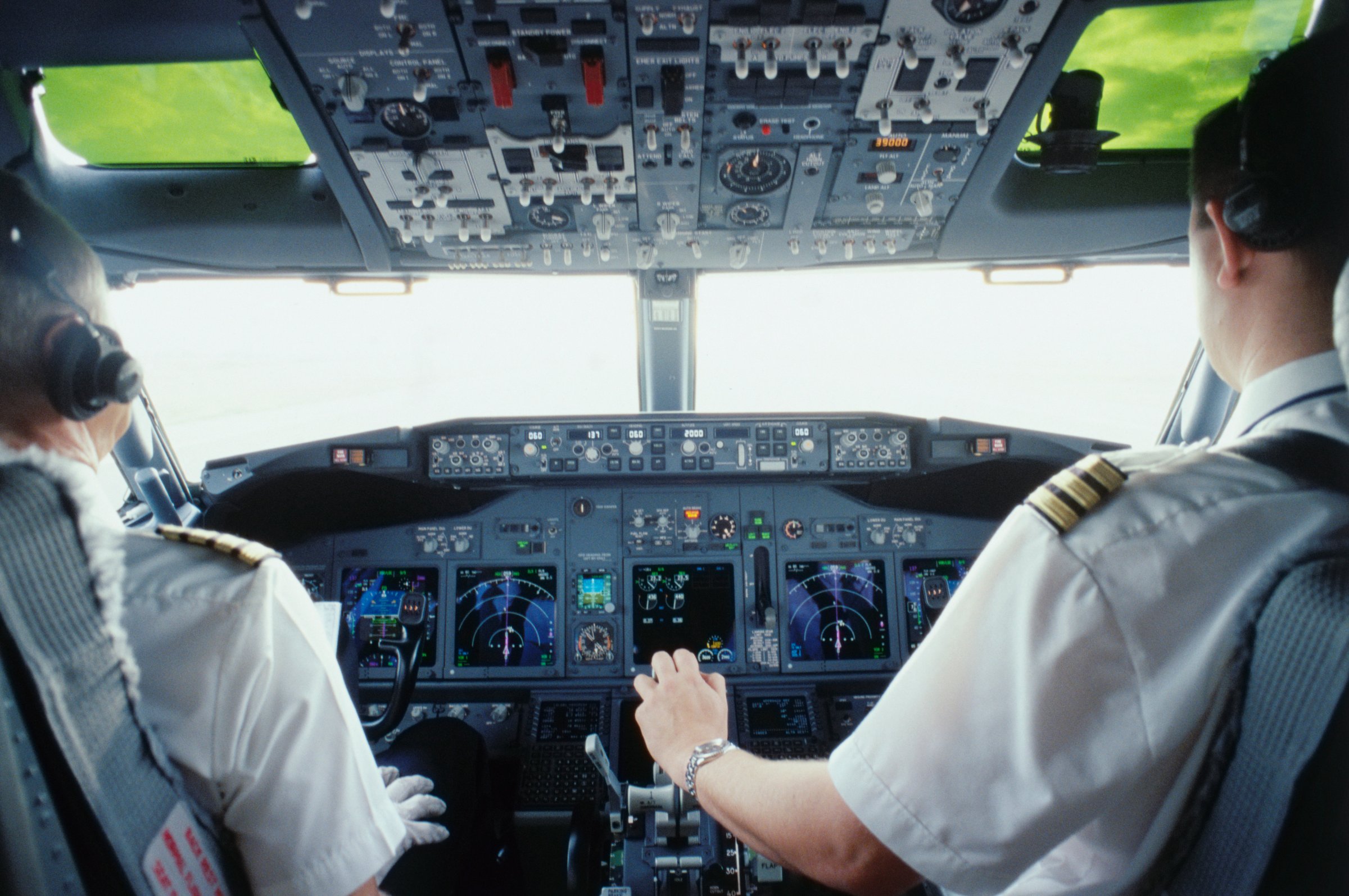 Pilot and Co-pilot in Cockpit
