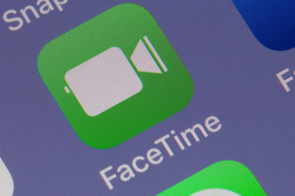 In this photo illustration, the FaceTime application logo is displayed on the screen of an Apple iPhone on Jan. 29, 2019 in Paris, France. An important security vulnerability has been discovered on FaceTime that lets people listen into others conversations without contacting them. (Getty Images)