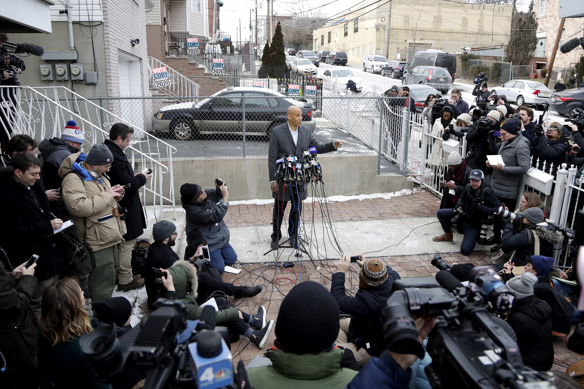 Sen. Cory Booker speaks during a news conference outside of his home in Newark, N.J. on Feb. 1, 2019. (Julio Cortez—AP)
