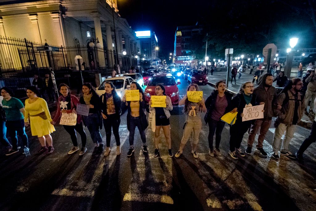 People protest against Nobel Peace Prize winner and former Costa Rican president Oscar Arias, who was accused of sexual assault in San Jose, Costa Rica, Feb. 8, 2019. (Ezequeil Becerra—AFP/Getty Images)
