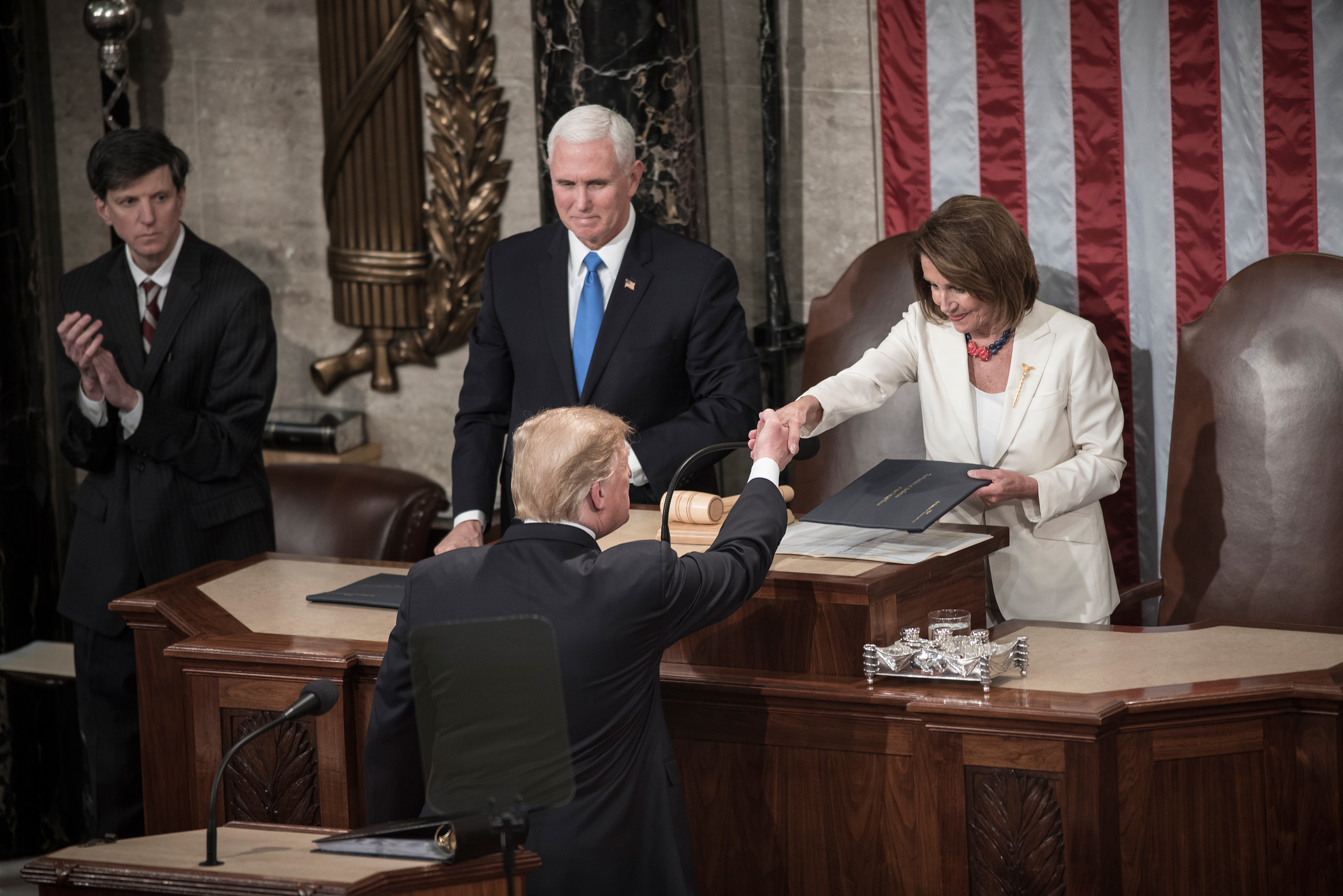 President Trump and House Speaker Nancy Pelosi shake hands at the State of the Union speech on Feb. 5, 2019. (David Butow—Redux for TIME)