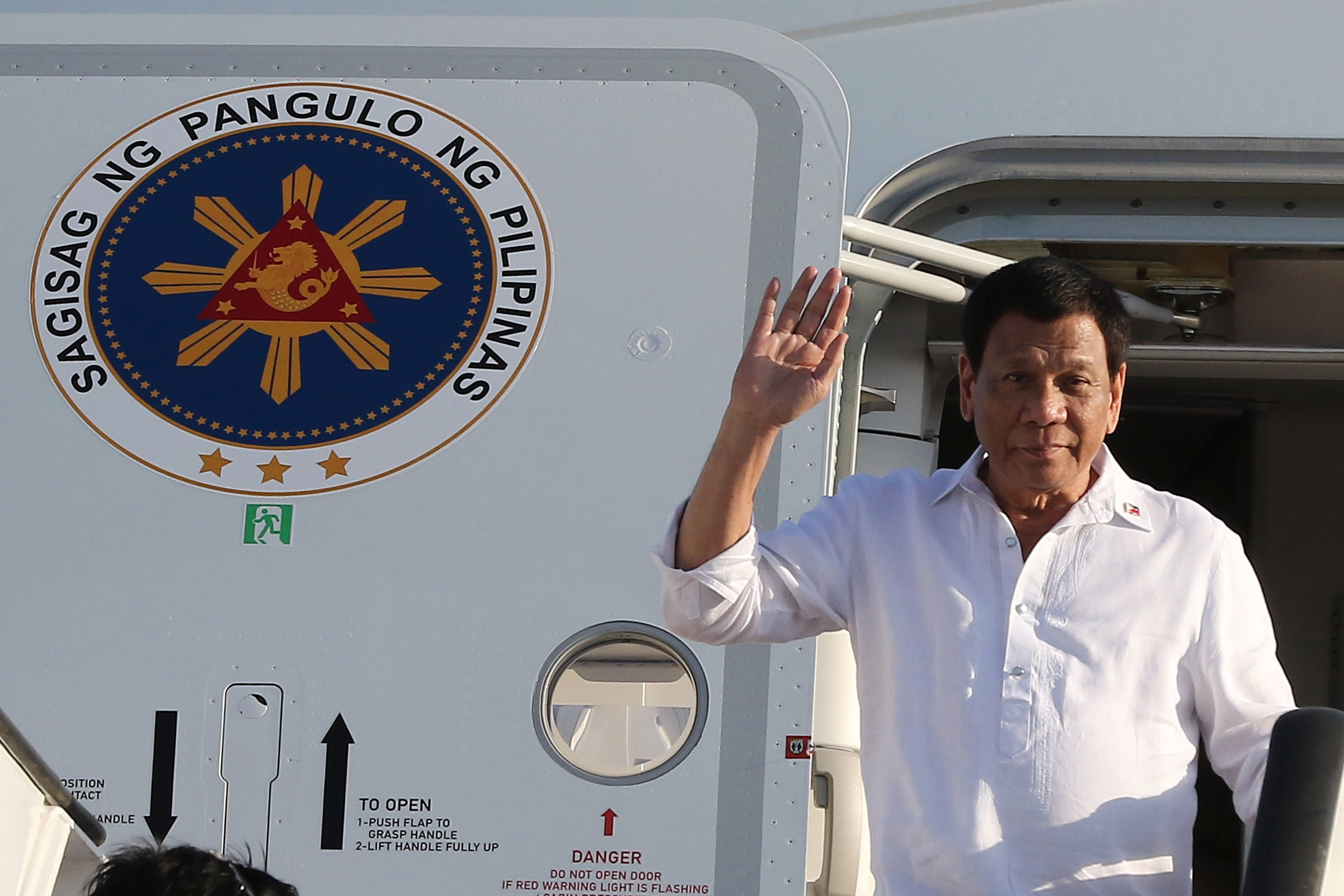 Philippine President Rodrigo Duterte waves upon his arrival in Amman, Jordan on Sept. 5, 2018. (Khalil Mazraawi&mdash;AFP/Getty Images)