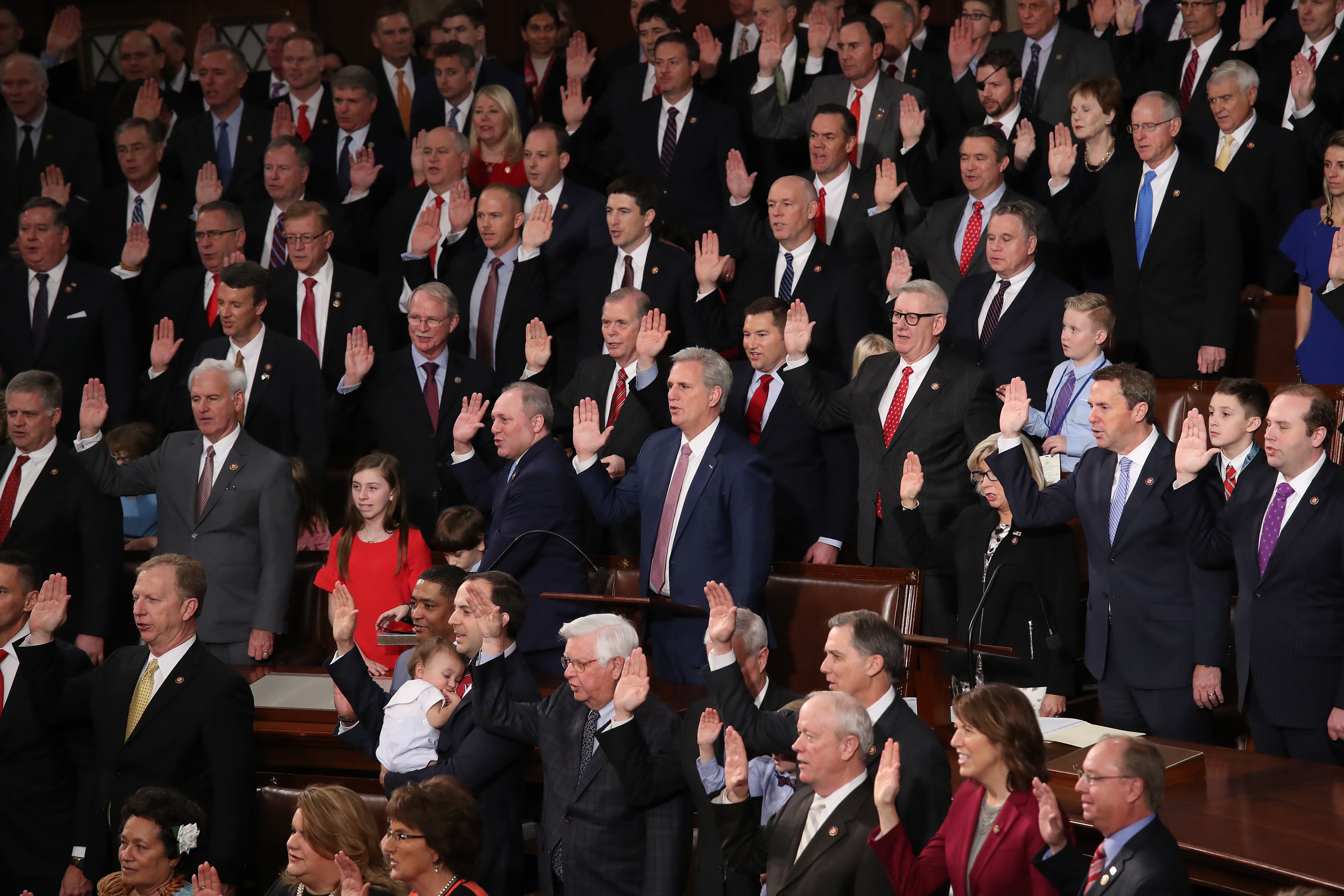 Republican members of the House of Representatives are sworn in during the first session of the 116th Congress at the U.S. Capitol. (Win McNamee—Getty Images)