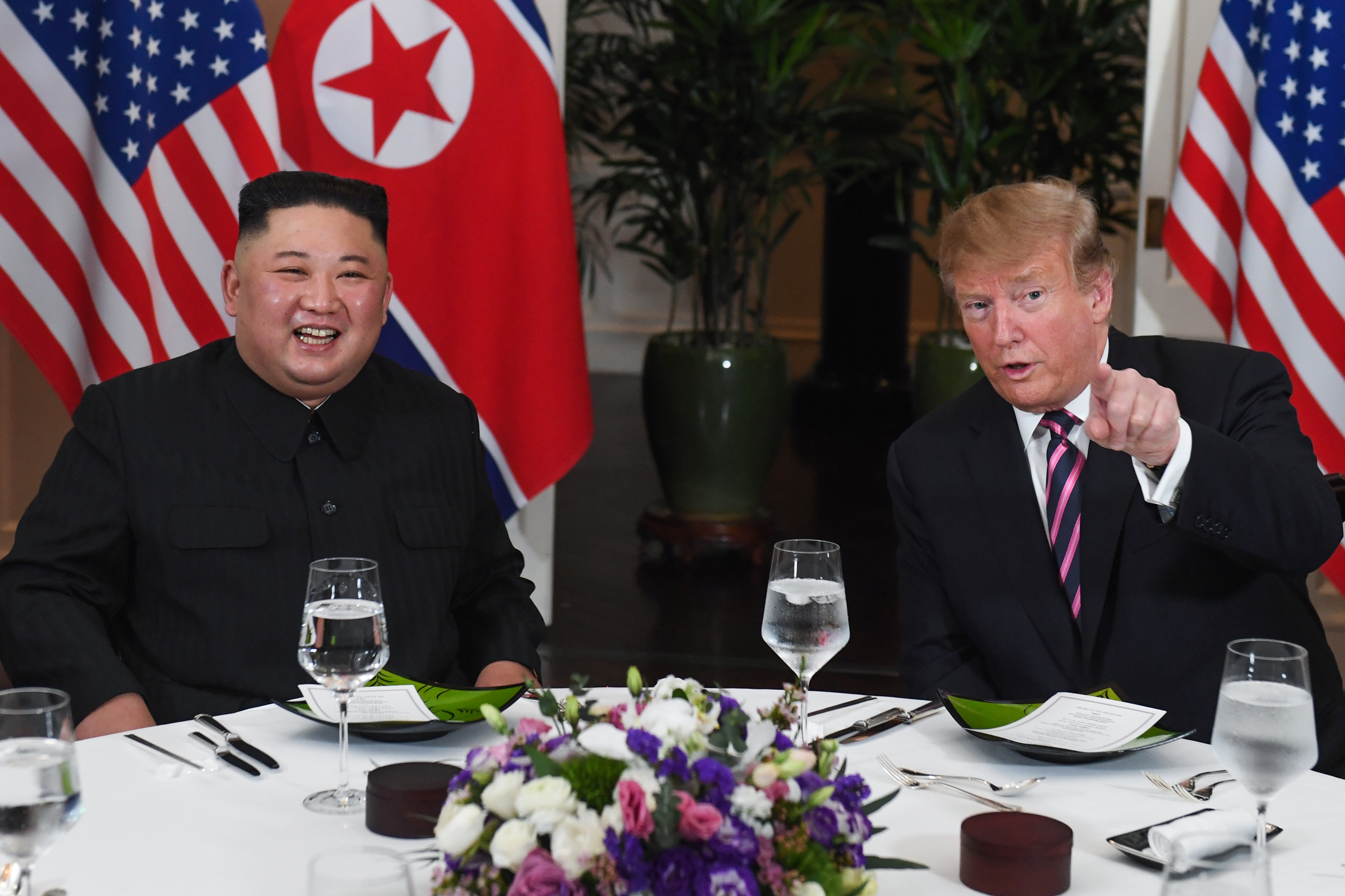 President Donald Trump and North Korea's leader Kim Jong Un sit for a dinner at the Sofitel Legend Metropole hotel in Hanoi, Vietnam on Feb. 27, 2019. (Saul Loeb—AFP/Getty Images)