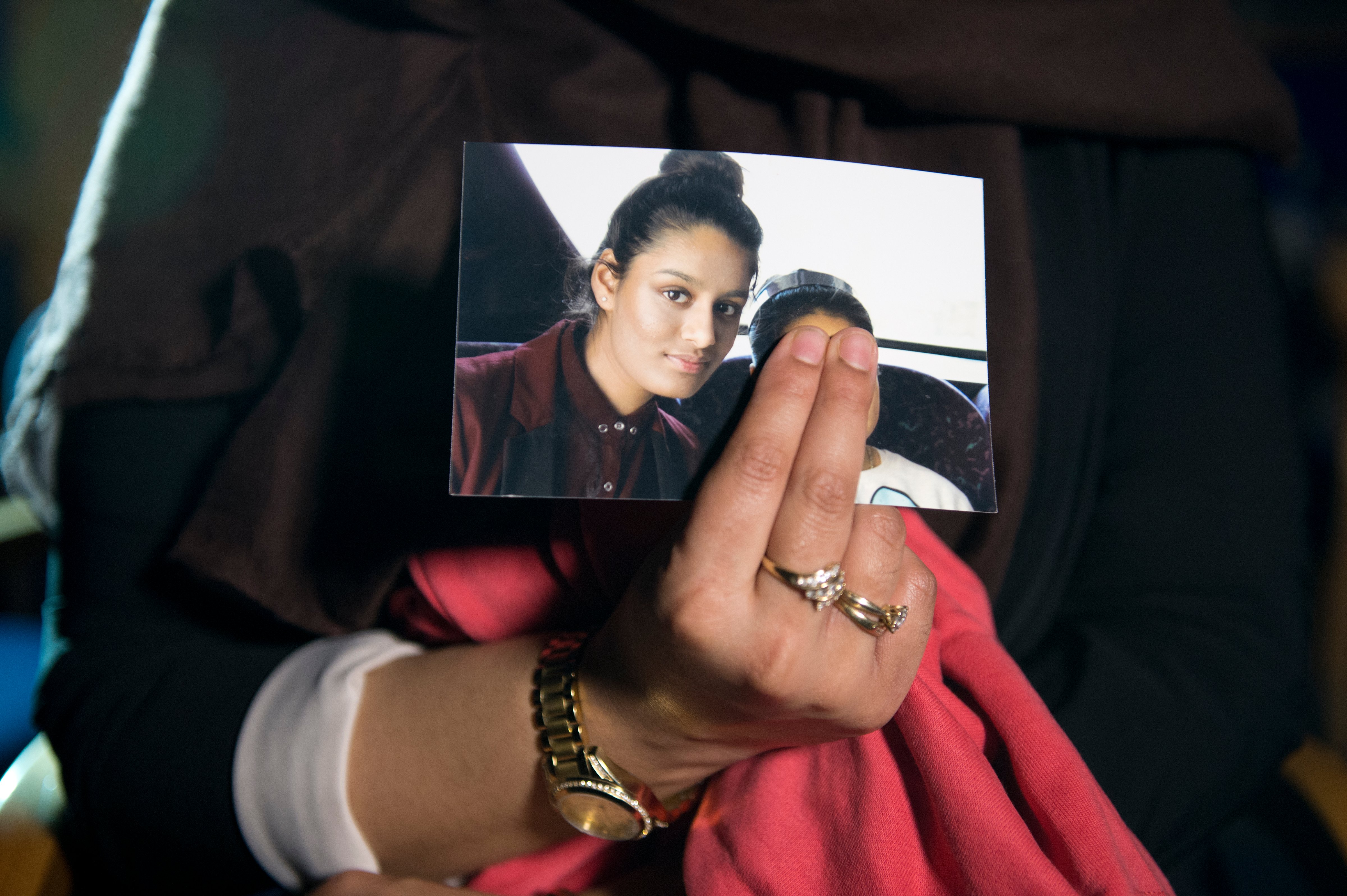 Renu Begum holds a photo of her sister, Shamima Begum, 15, believed to have fled to Syria to join Islamic State. February 22, 2015 in London, England. (WPA—Getty Images)